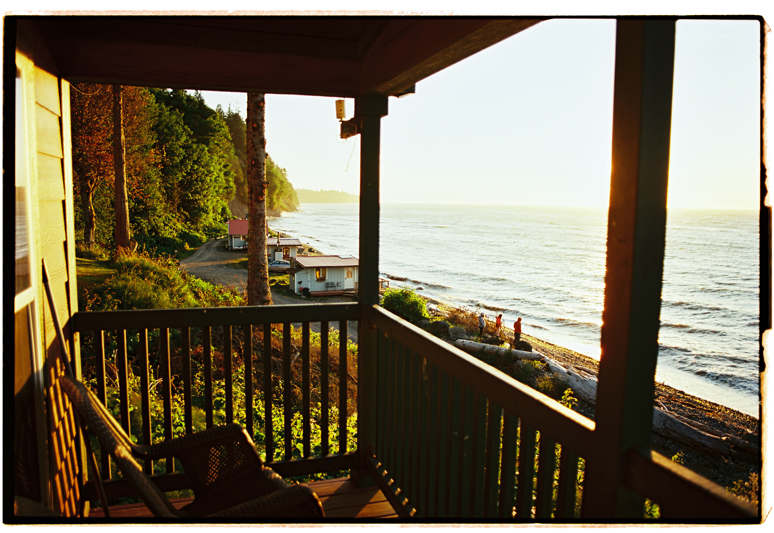 pnw141-cottage-porch-ocean-at-sunset.png