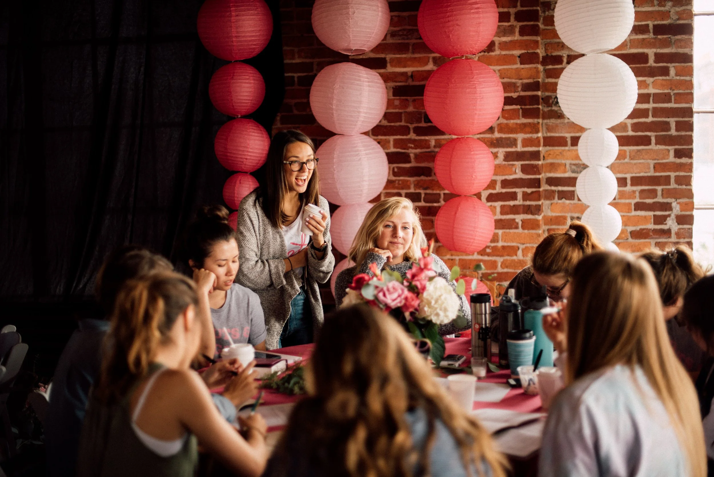 d225-women-talking-at-table-conference.jpg