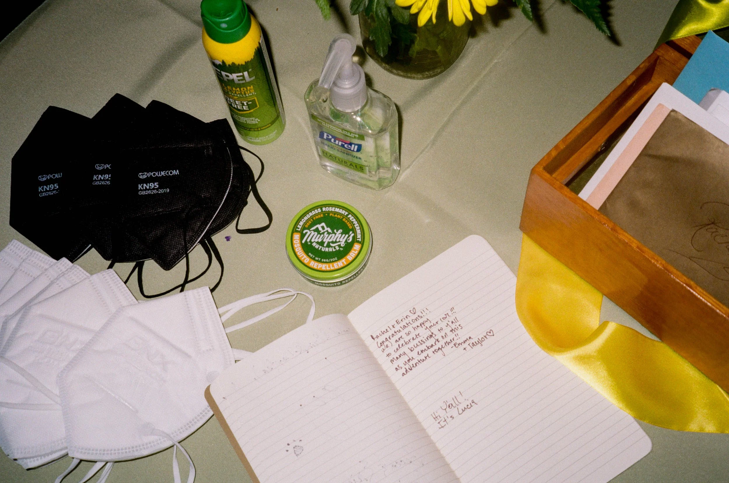 REW62-face-masks-sanitizer-on-table-at-wedding.jpg