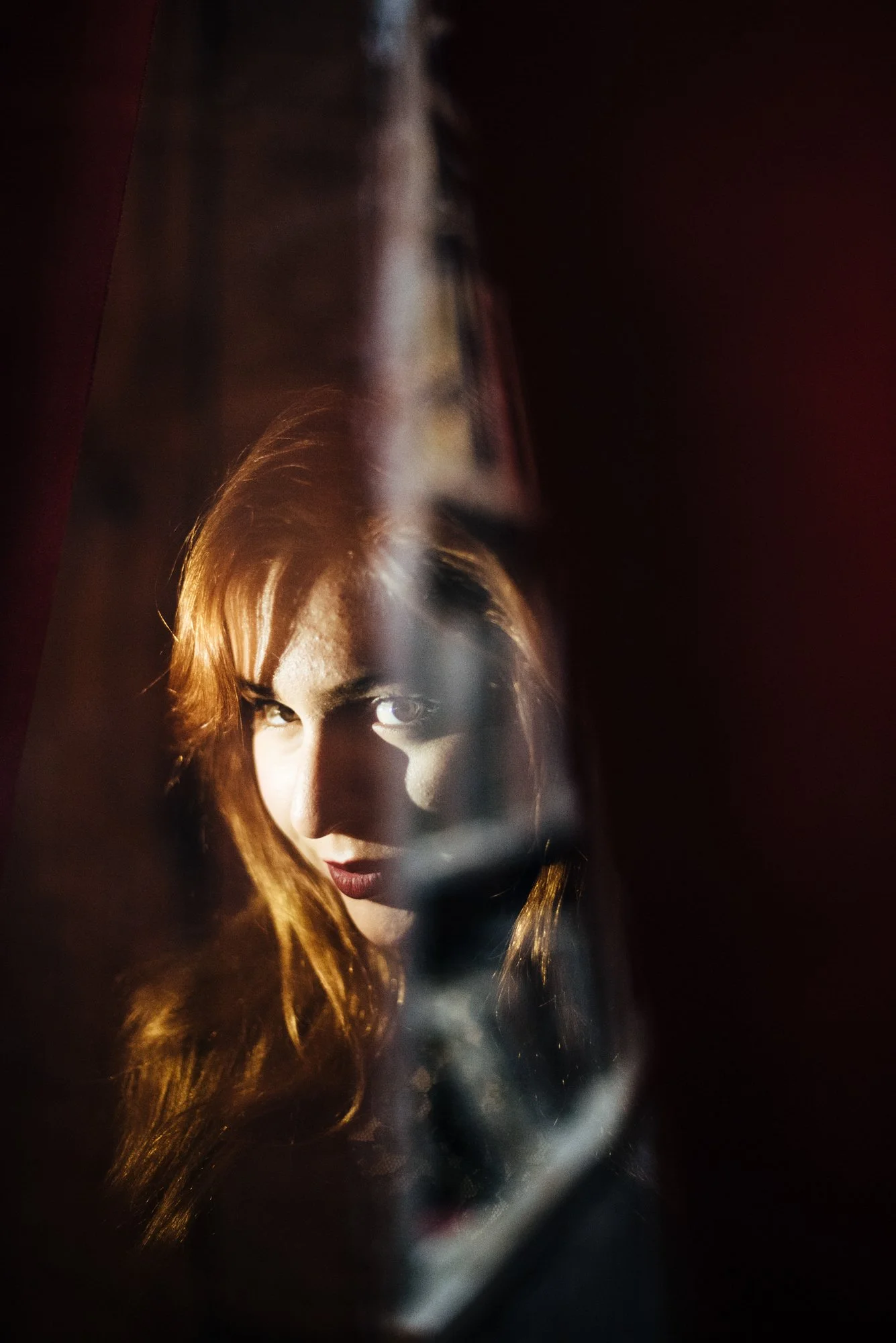 BT6-woman-side-eye-dramatic-light.jpg