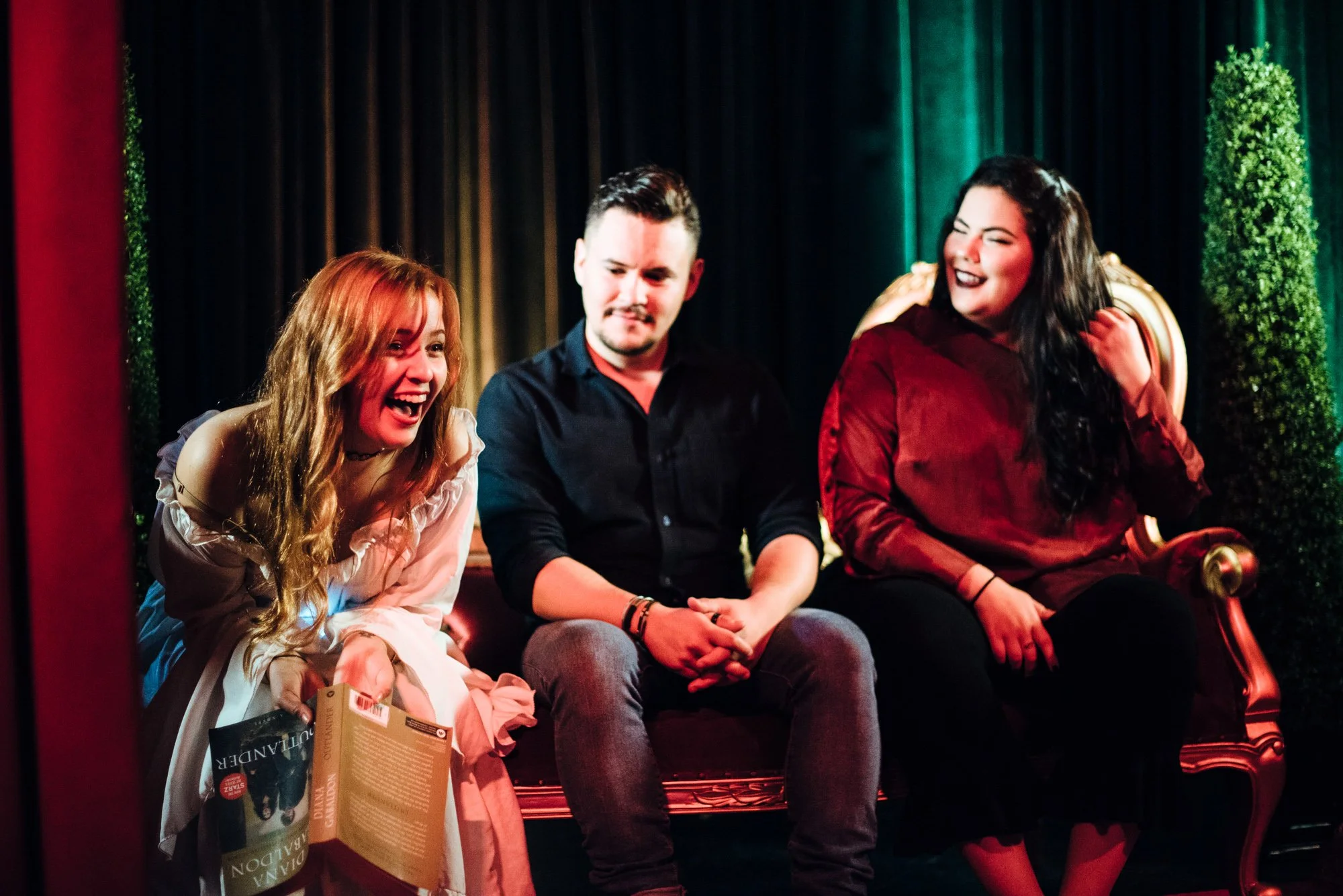 BT185-three-people-laughing-on-couch.jpg
