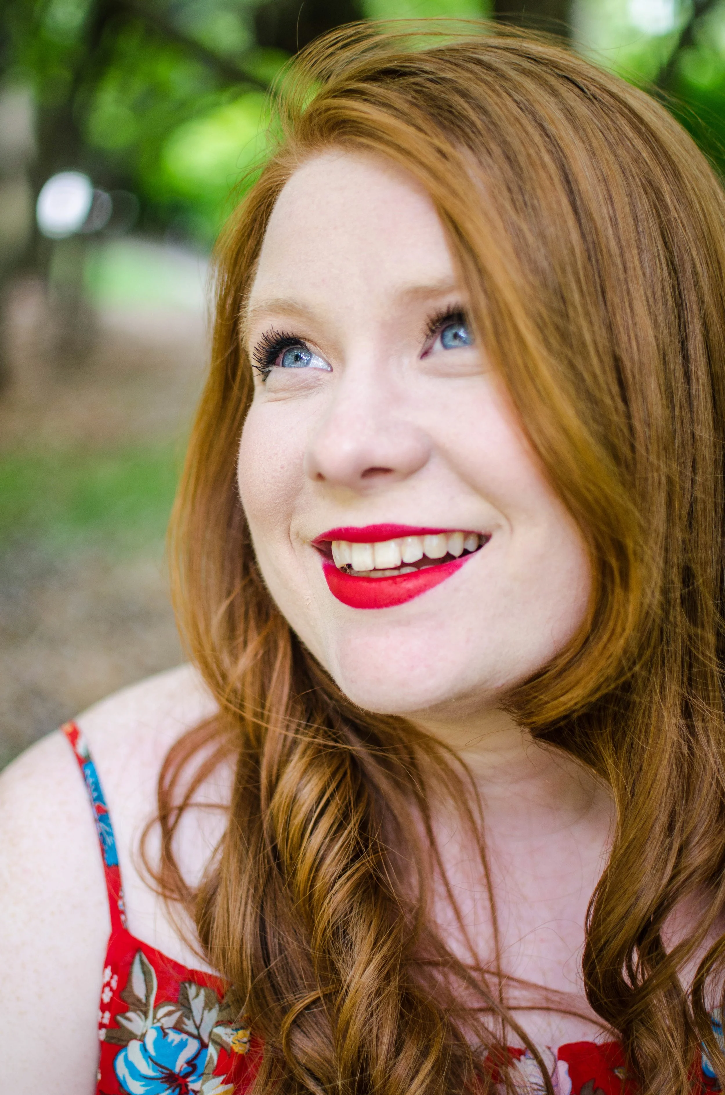BT72-woman-red-hair-lipstick-smiling.jpg
