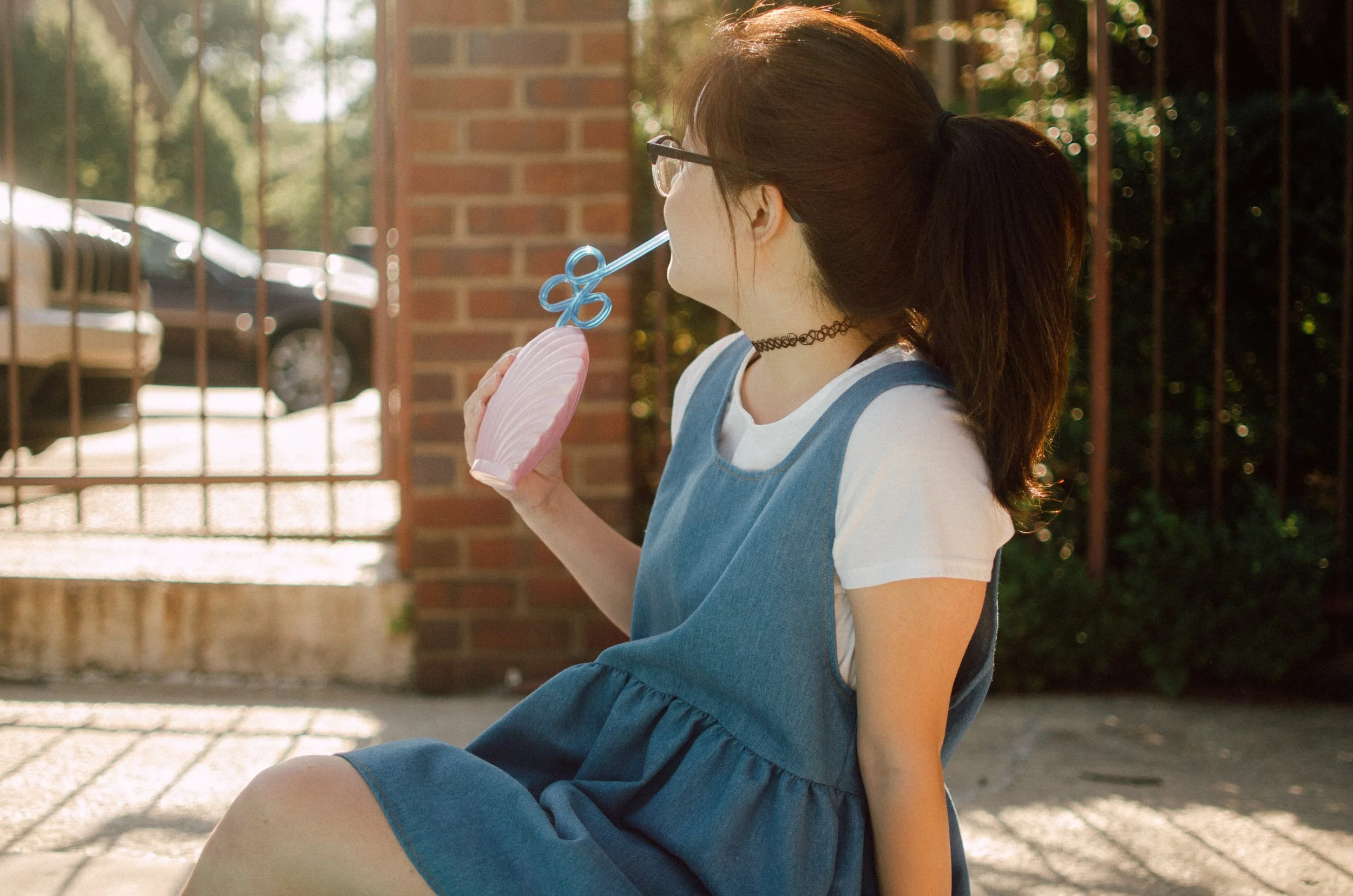 d193-woman-sipping-summer-drink.jpg