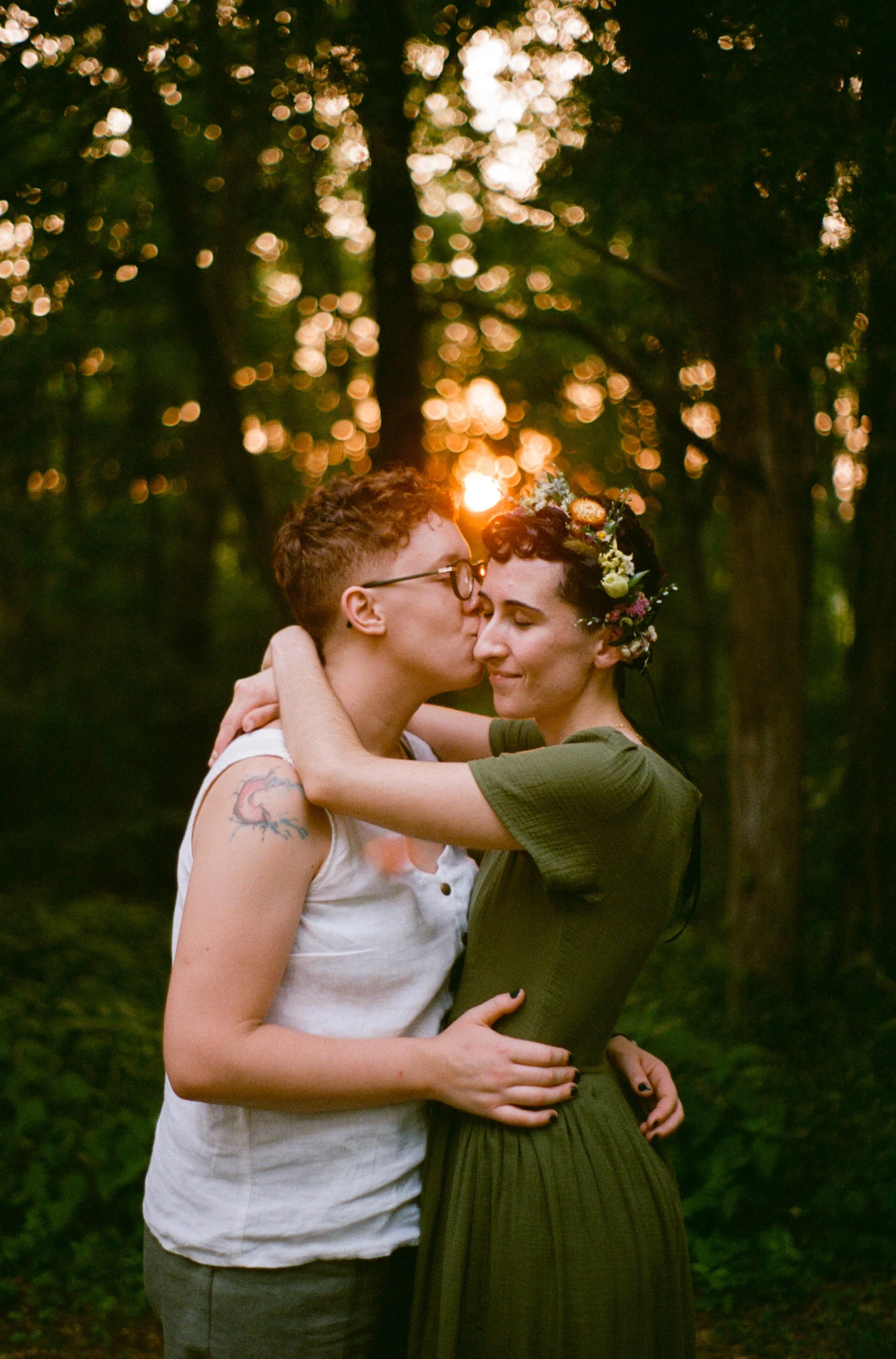 REW87-women-in-nature-holding-each-other-sunset.jpg