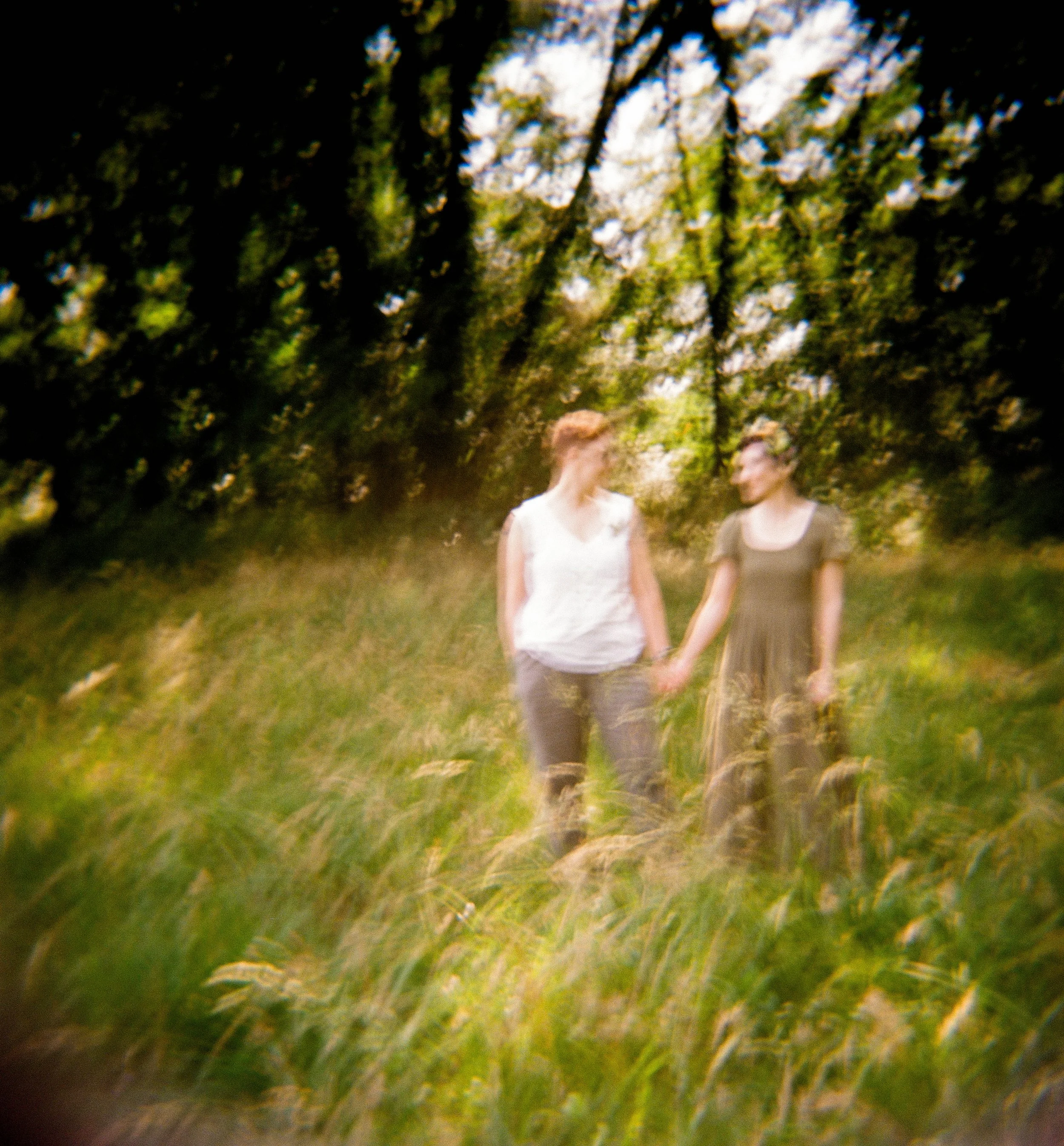 REW25-blurry-holga-women-holding-hands.jpg