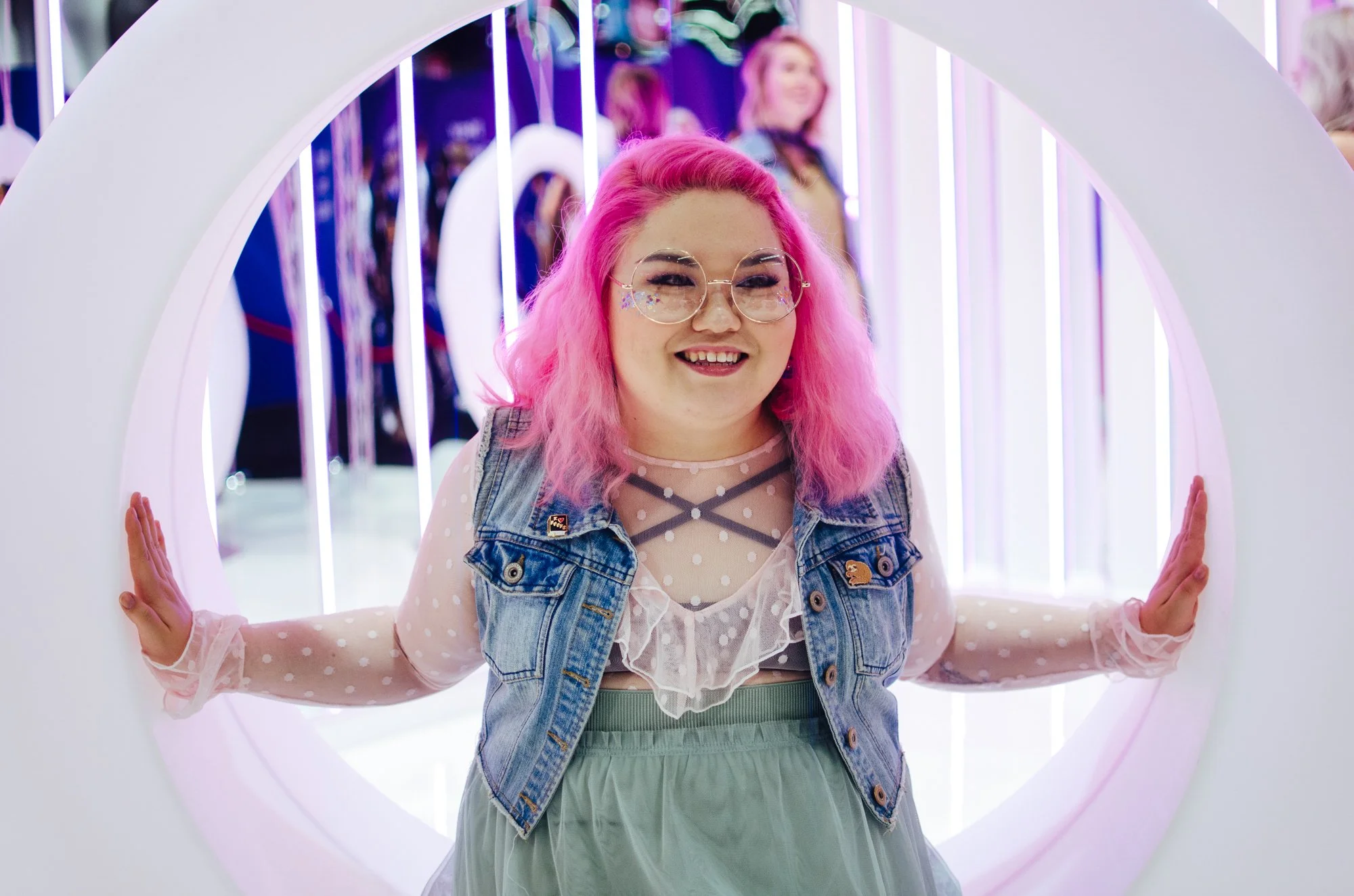 BT12-asian-woman-pink-hair-sitting-in-circle.jpg