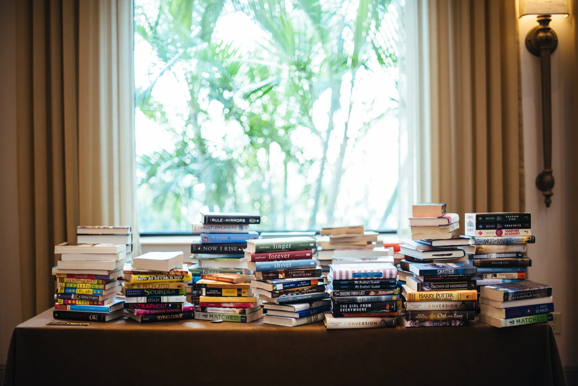 BT128-stacks-of-books-on-tables.jpg