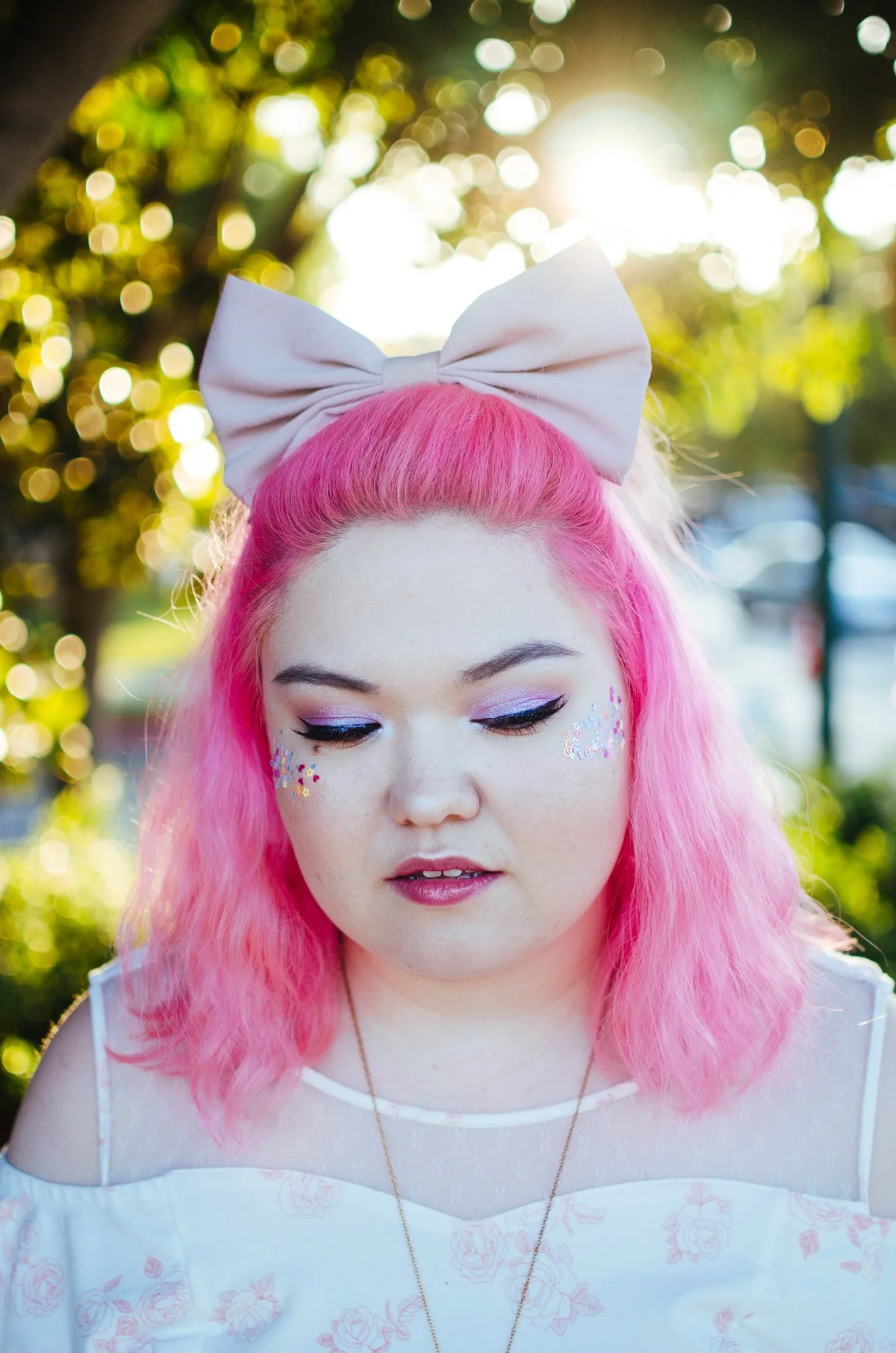 BT17-asian-woman-pink-hair-sunset-bow.jpg