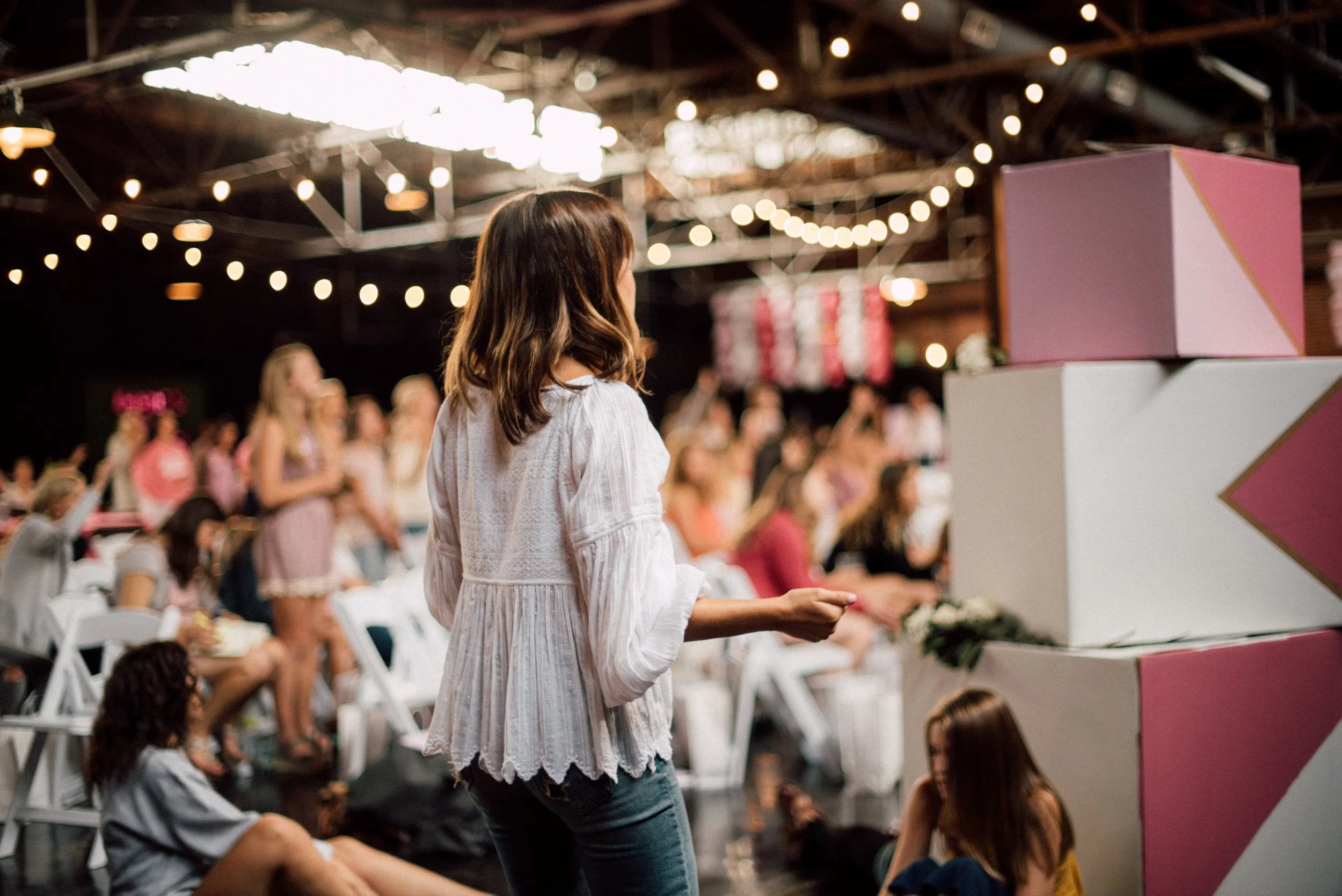 d255-woman-standing-worshipping-conference.jpg