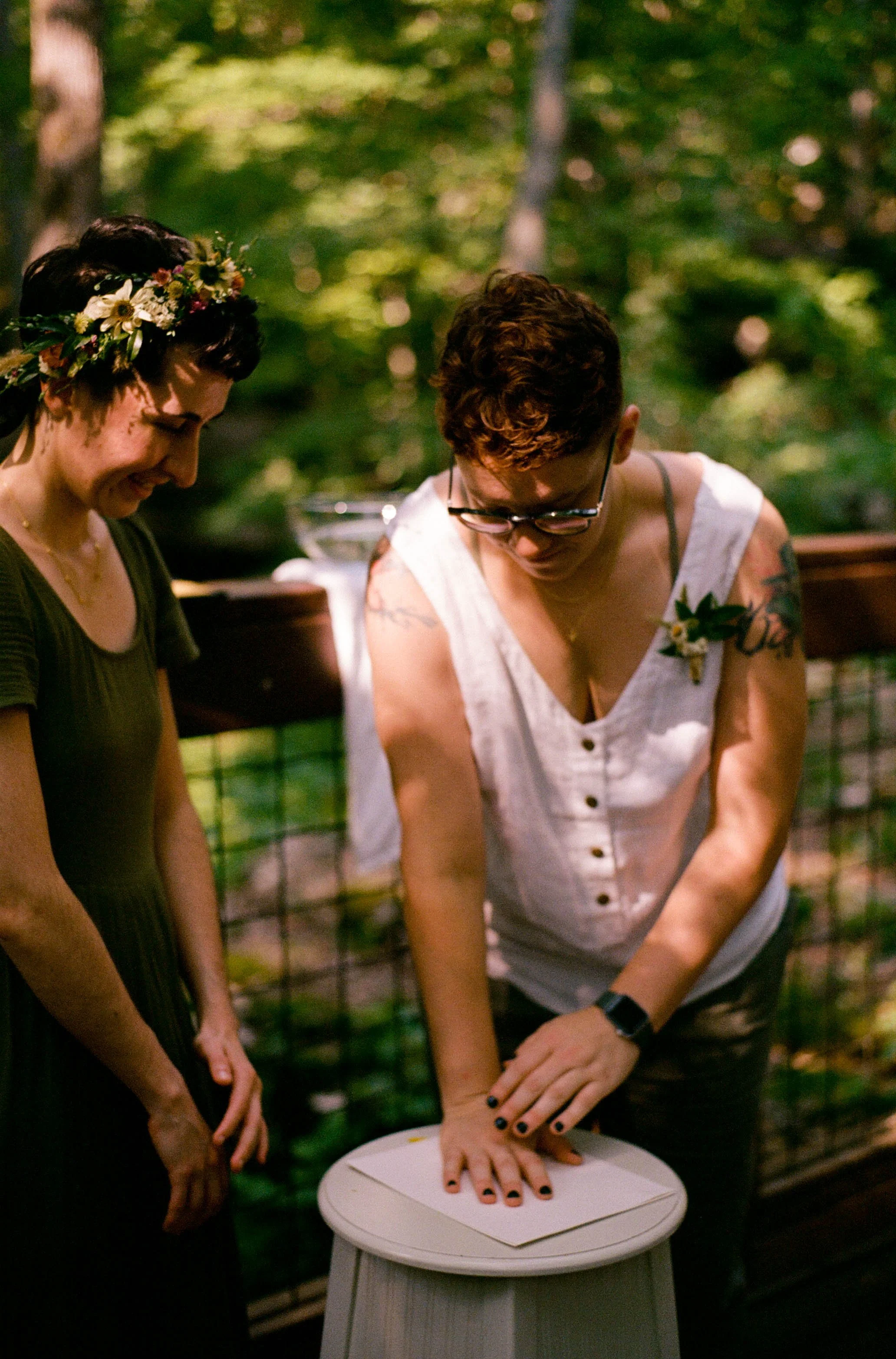 REW58-woman-hand-printing-lgbtq-wedding.jpg