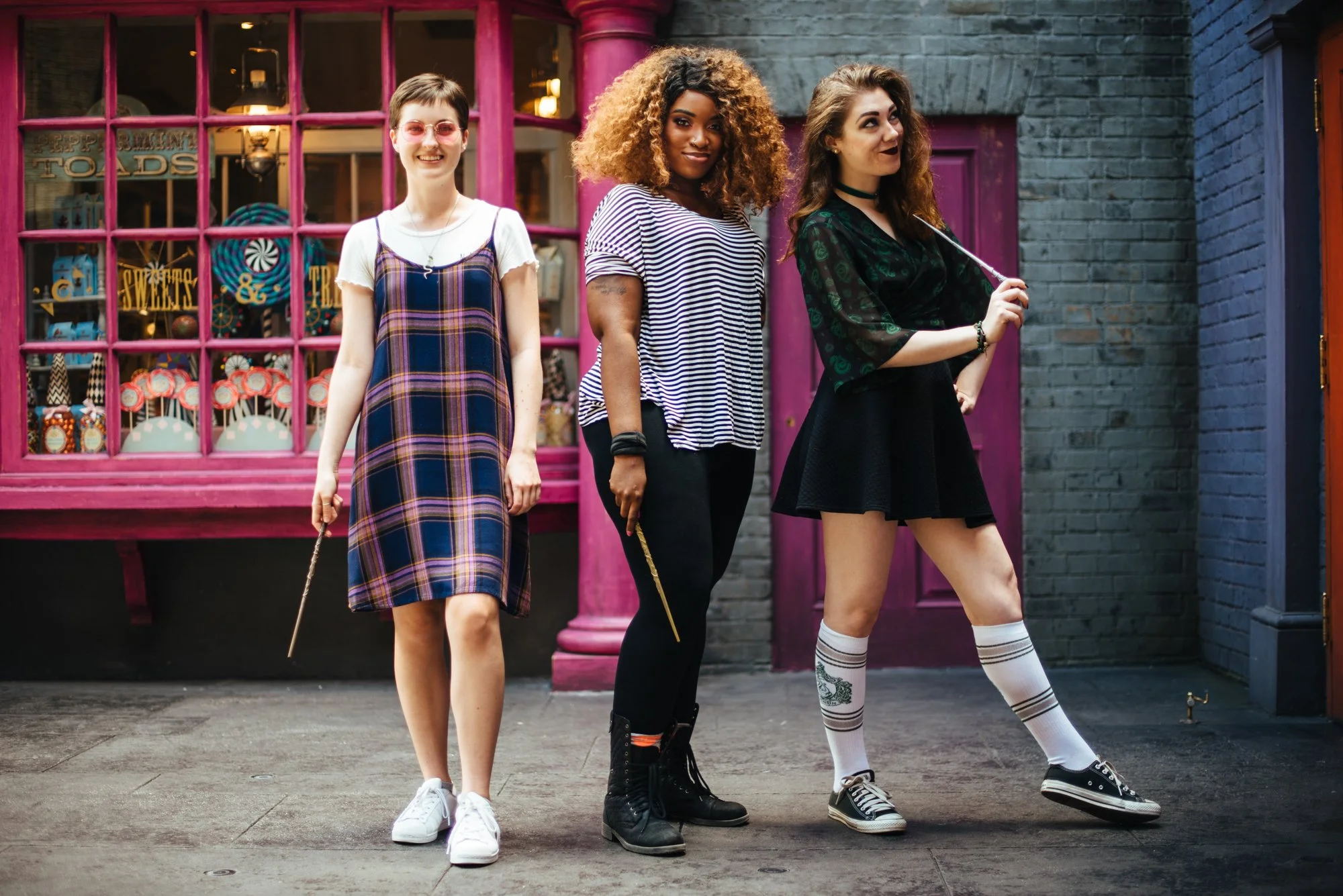 BT99-three-people-with-magic-wands.jpg