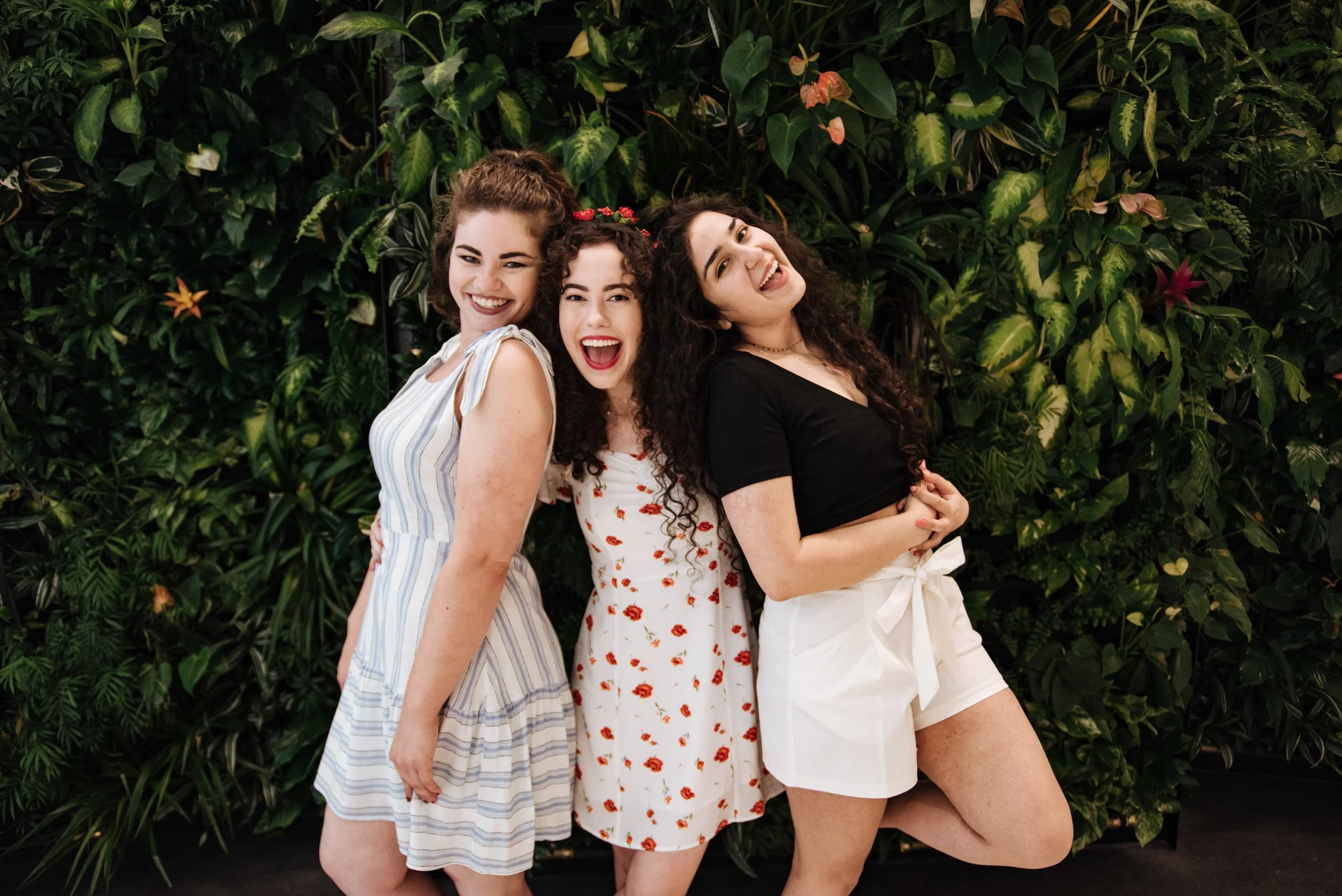 BT249-three-women-posing-in-greenery-leaves.jpg