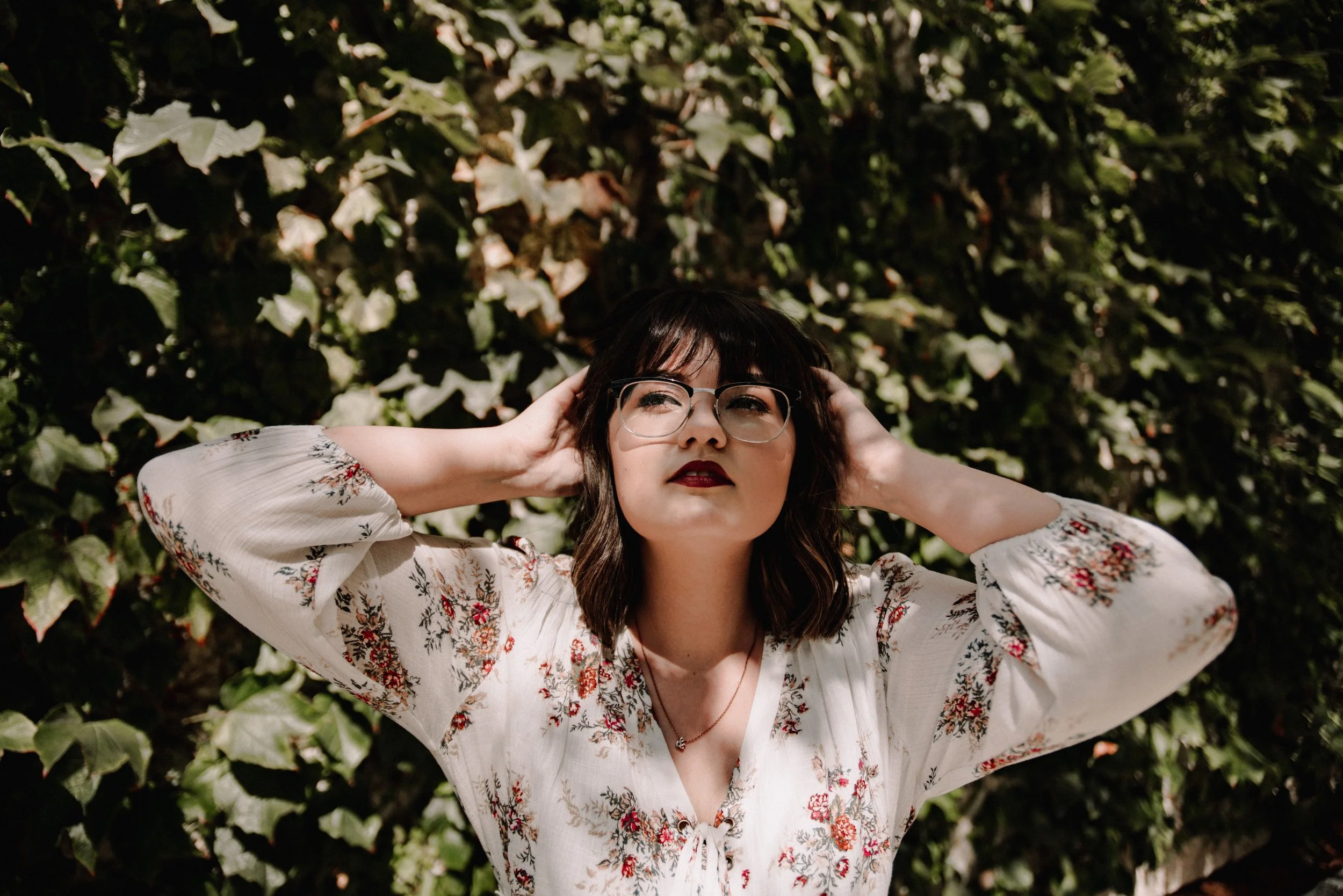 BT20-woman-dark-hair-glasses-in-shadow.jpg