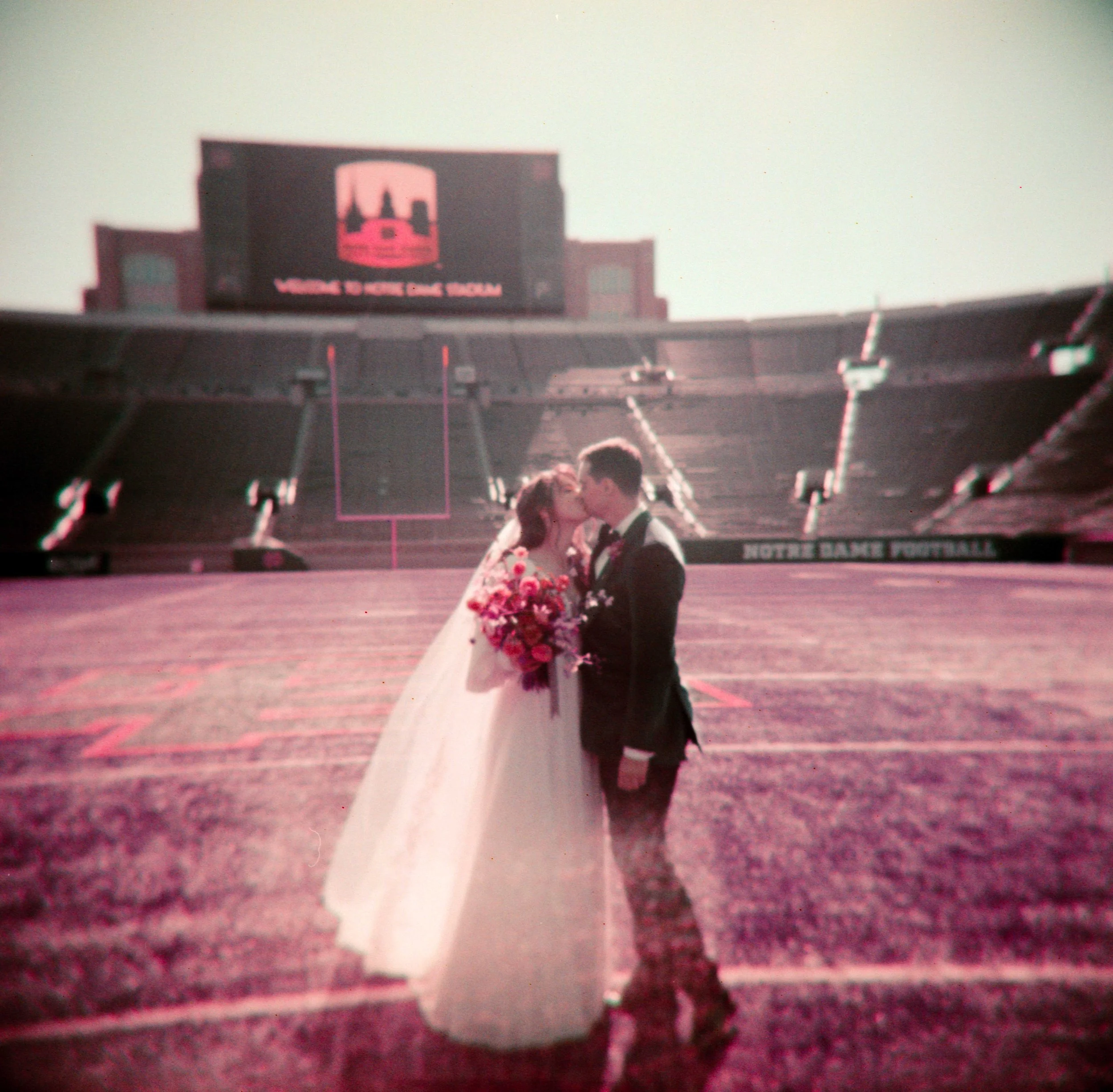 LBW45-wedding-couple-notre-dame-football-stadium-lomo-purple.jpg