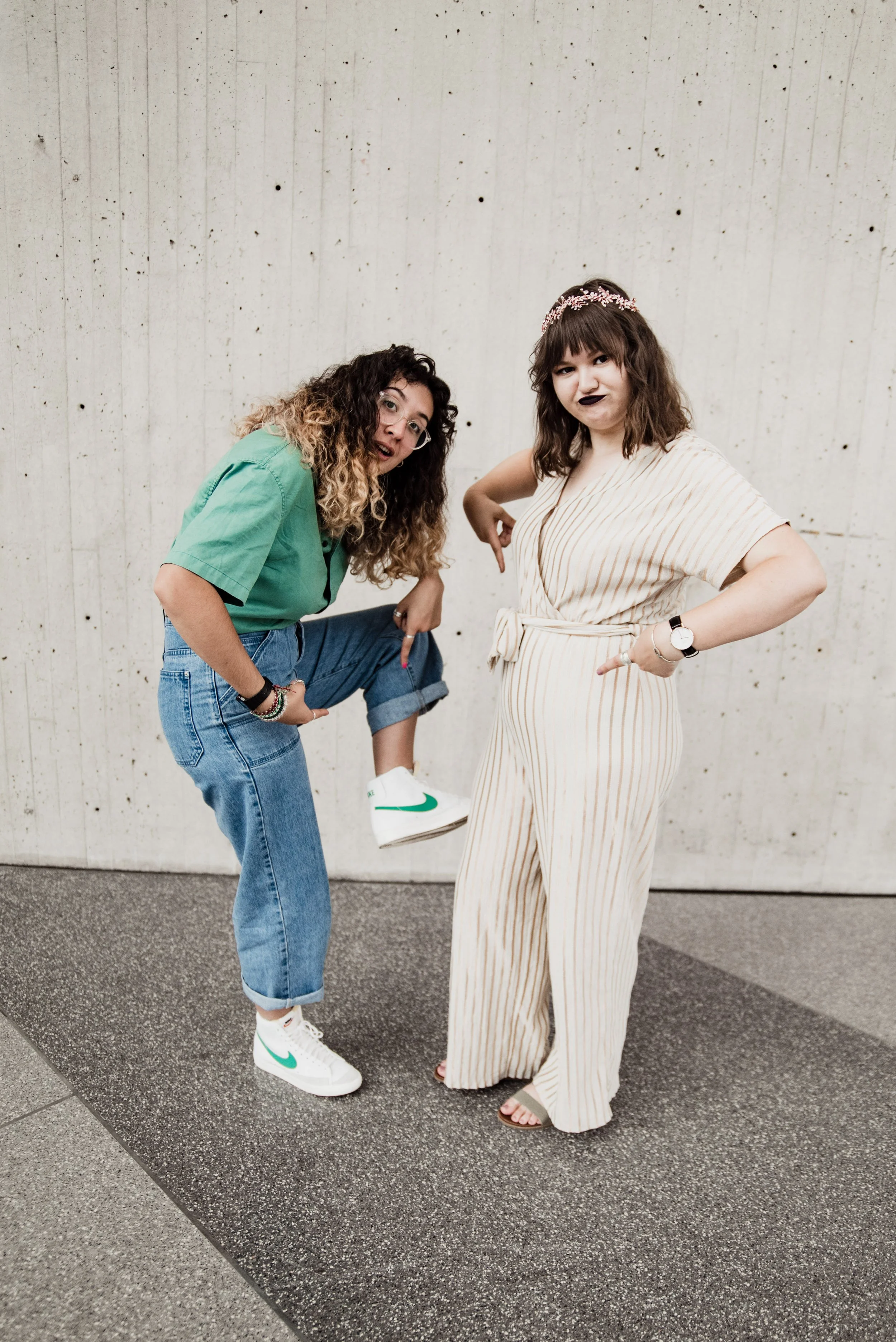 BT296-two-women-pointing-at-shoe.jpg