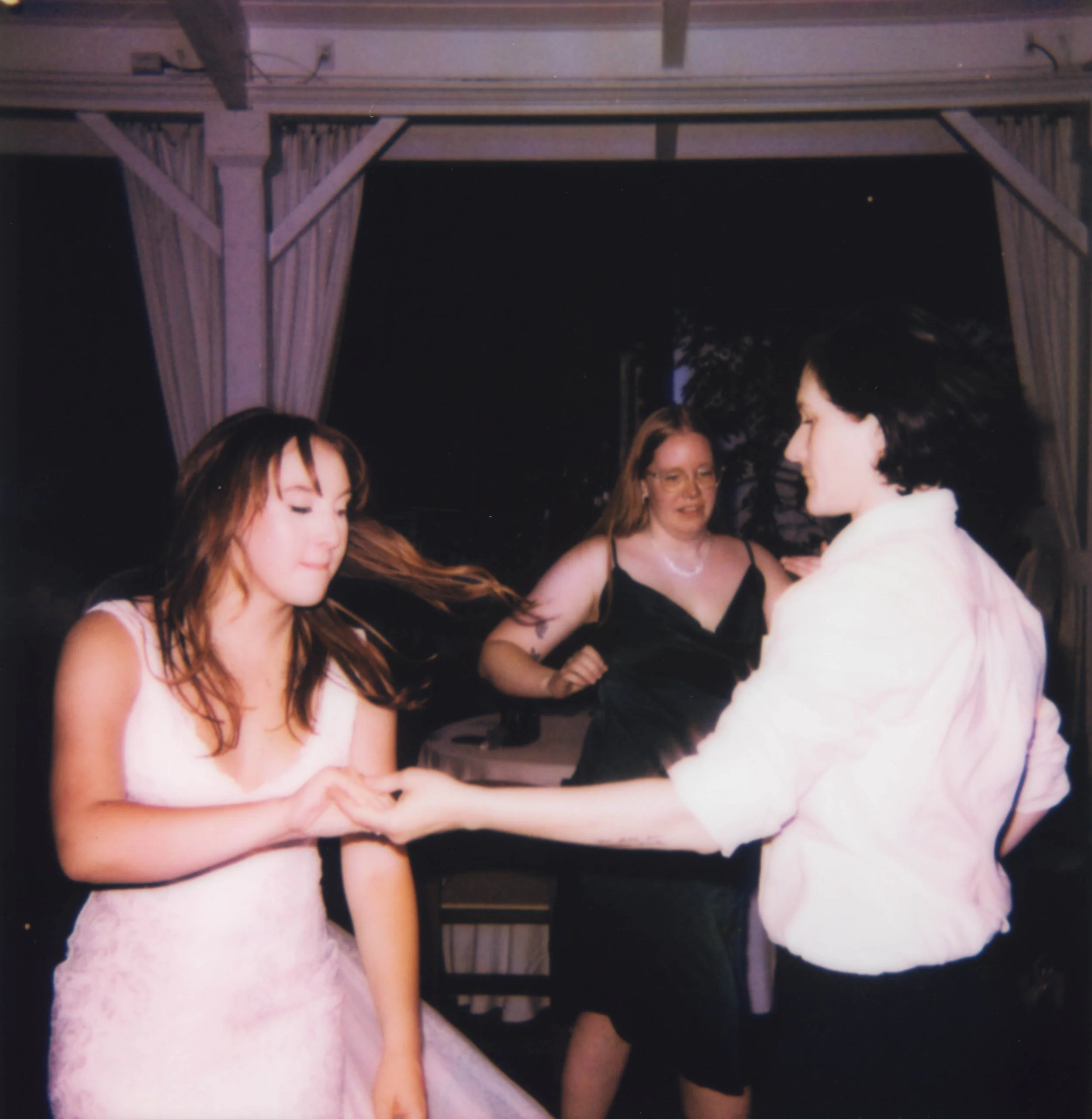 HRF84-lgbtq-brides-dancing-at-wedding-polaroid.jpg