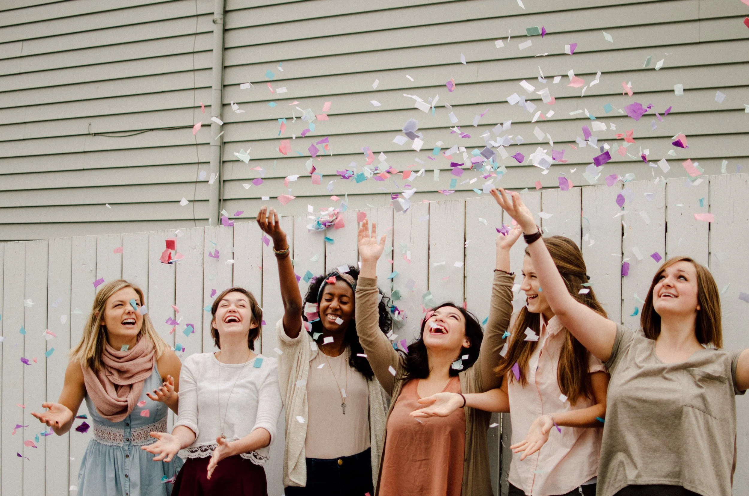 d40-college-girls-tossing-confetti.jpg