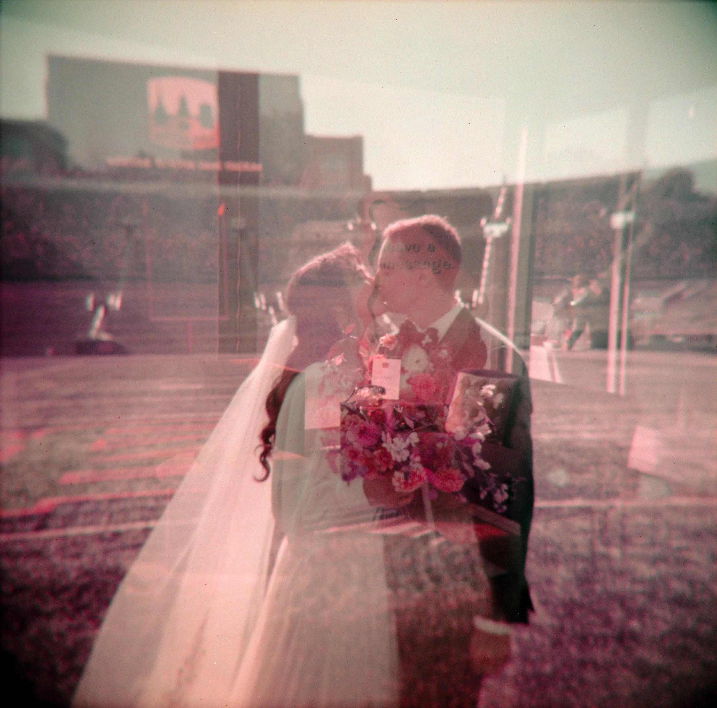 LBW46-bride-groom-notre-dame-football-stadium-lomo-purple.jpg