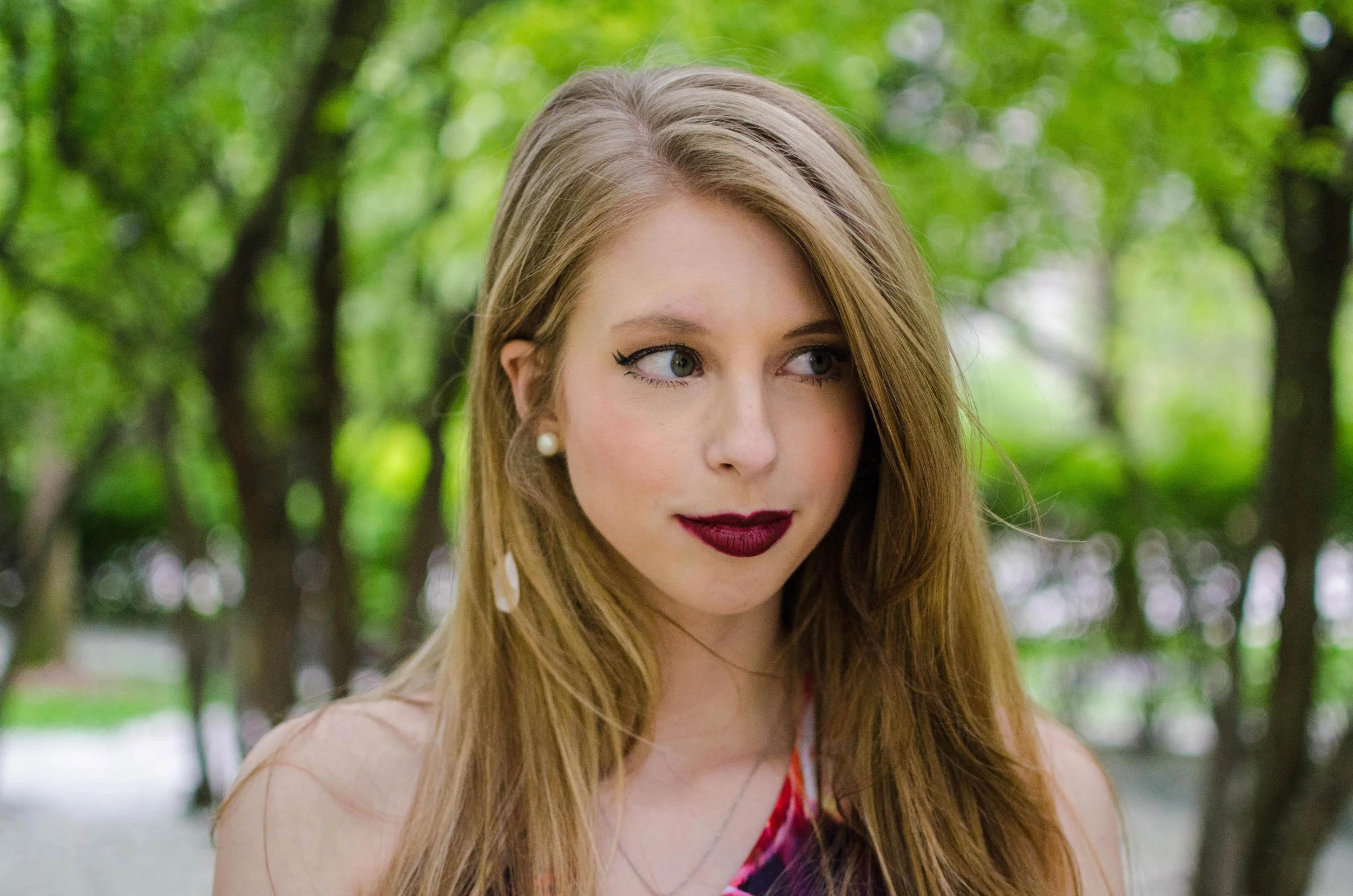 BT54-christine-riccio-dark-lipstick-green-background.jpg