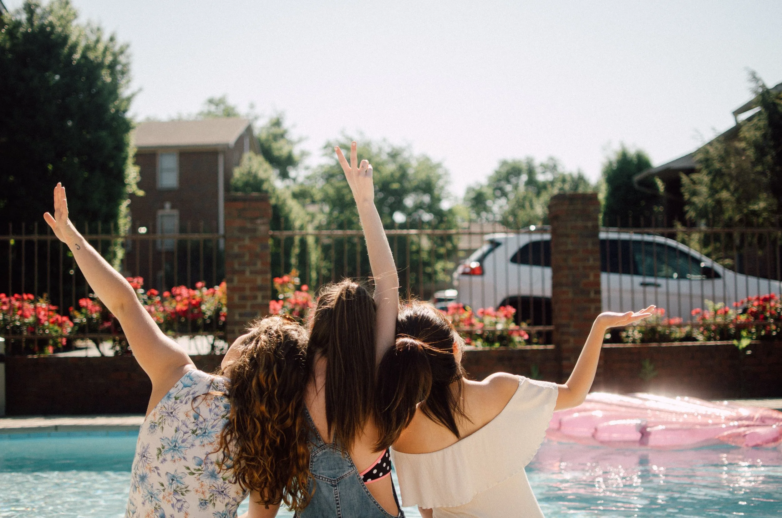 d196-women-arms-up-at-pool.jpg