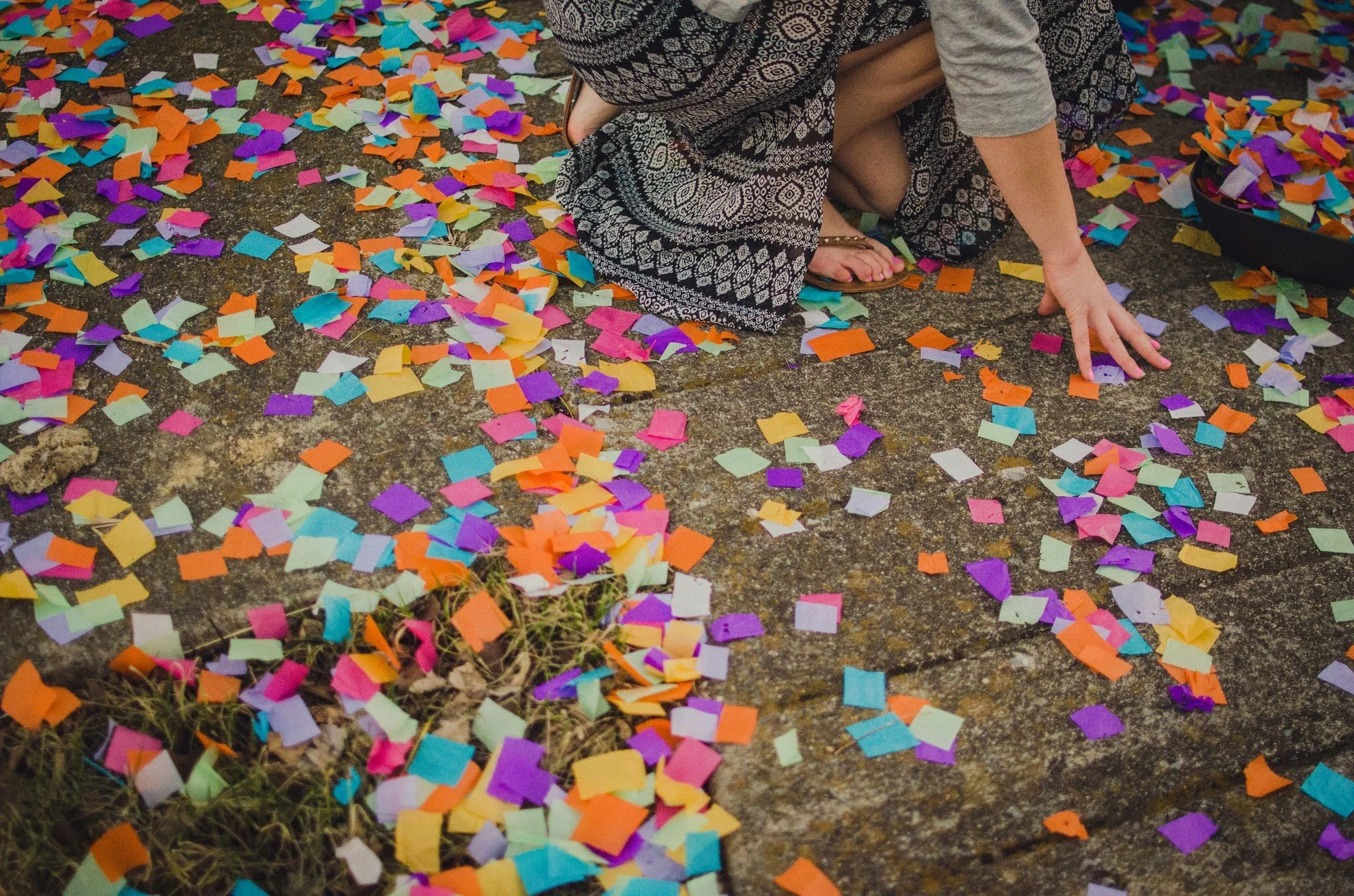d14-confetti-on-ground-hand.jpg