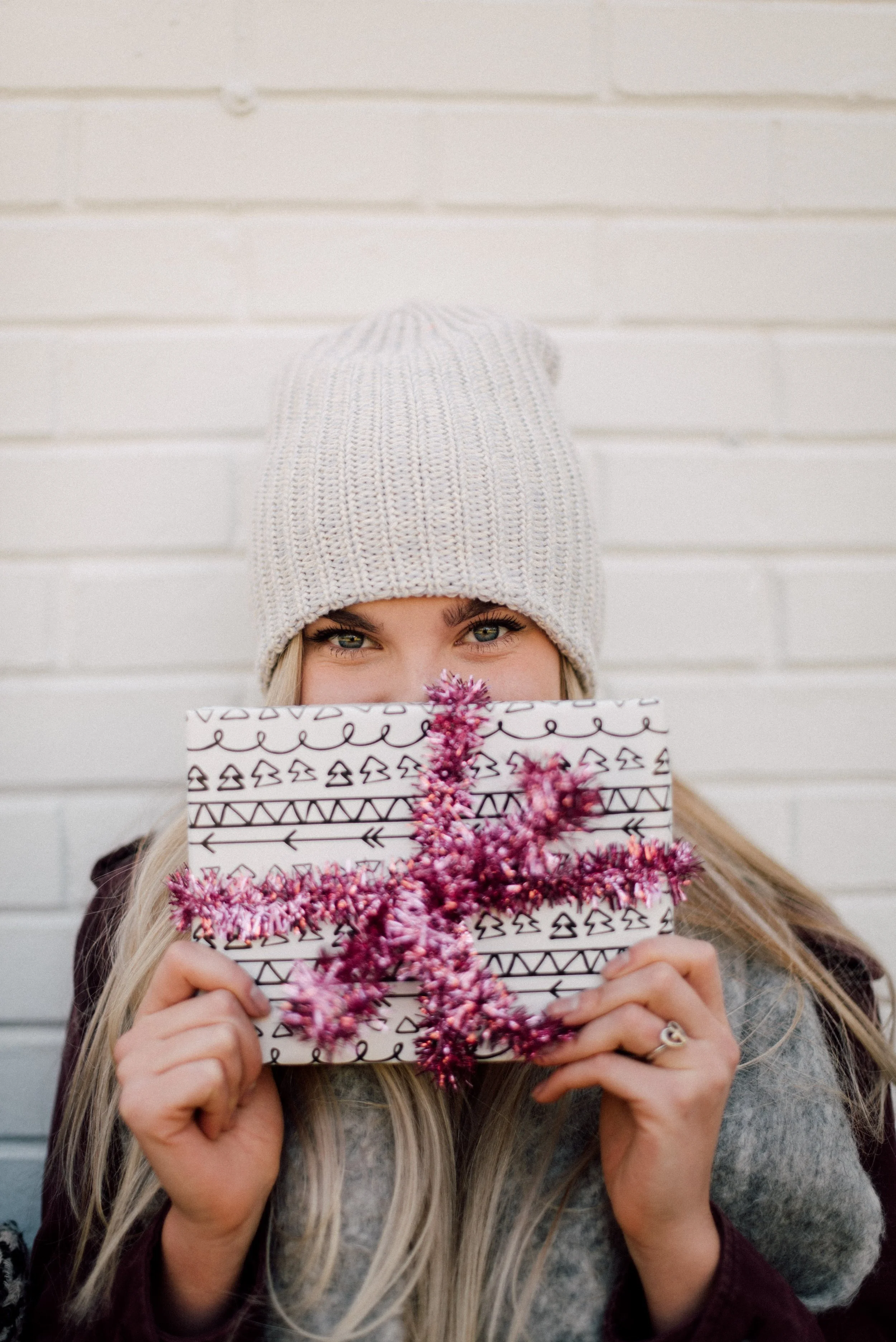 d246-woman-holding-gift-christmas.jpg