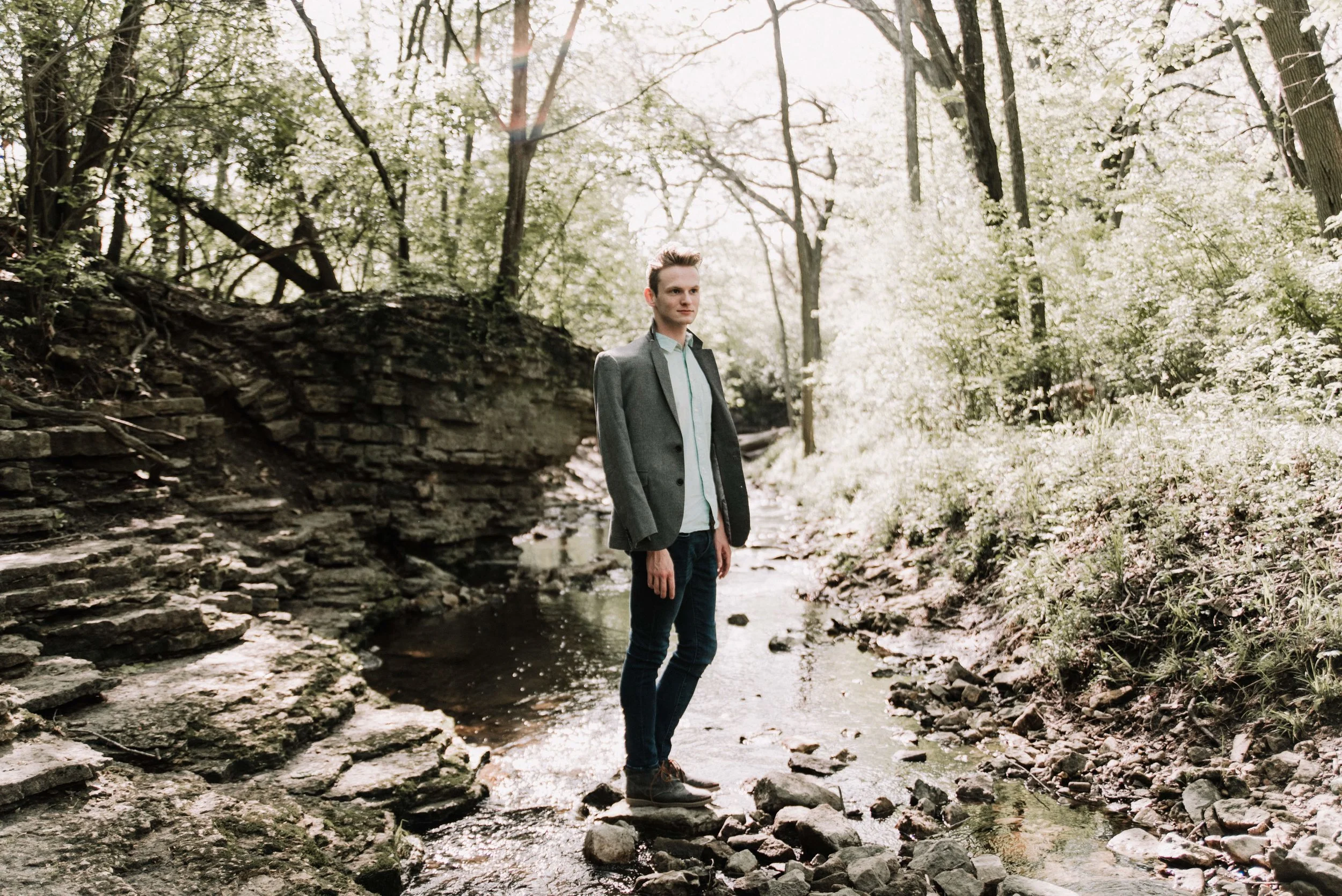 BT220-man-standing-in-stream-nature.jpg