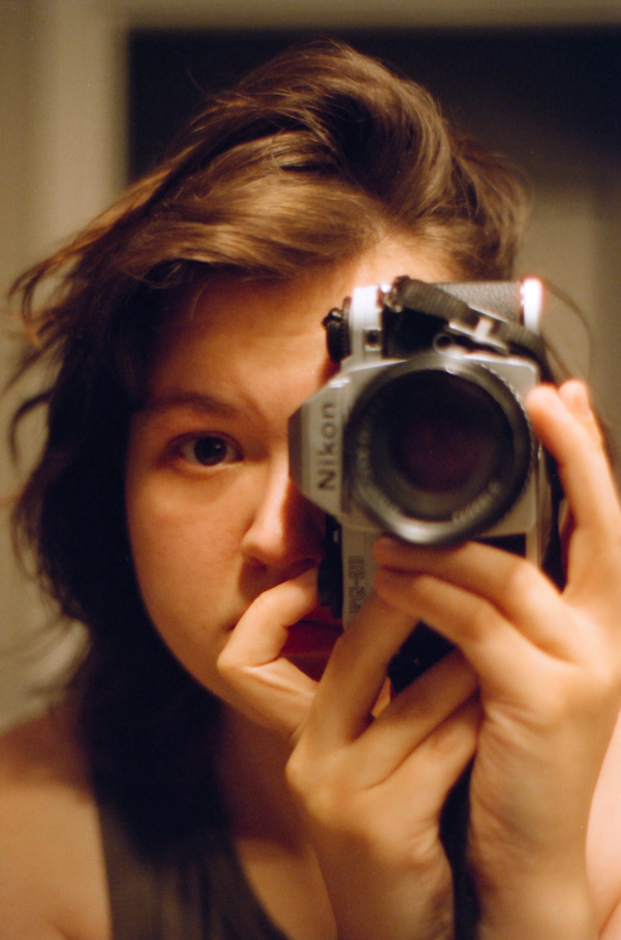 week-37-close-up-face-of-woman-with-camera.jpg