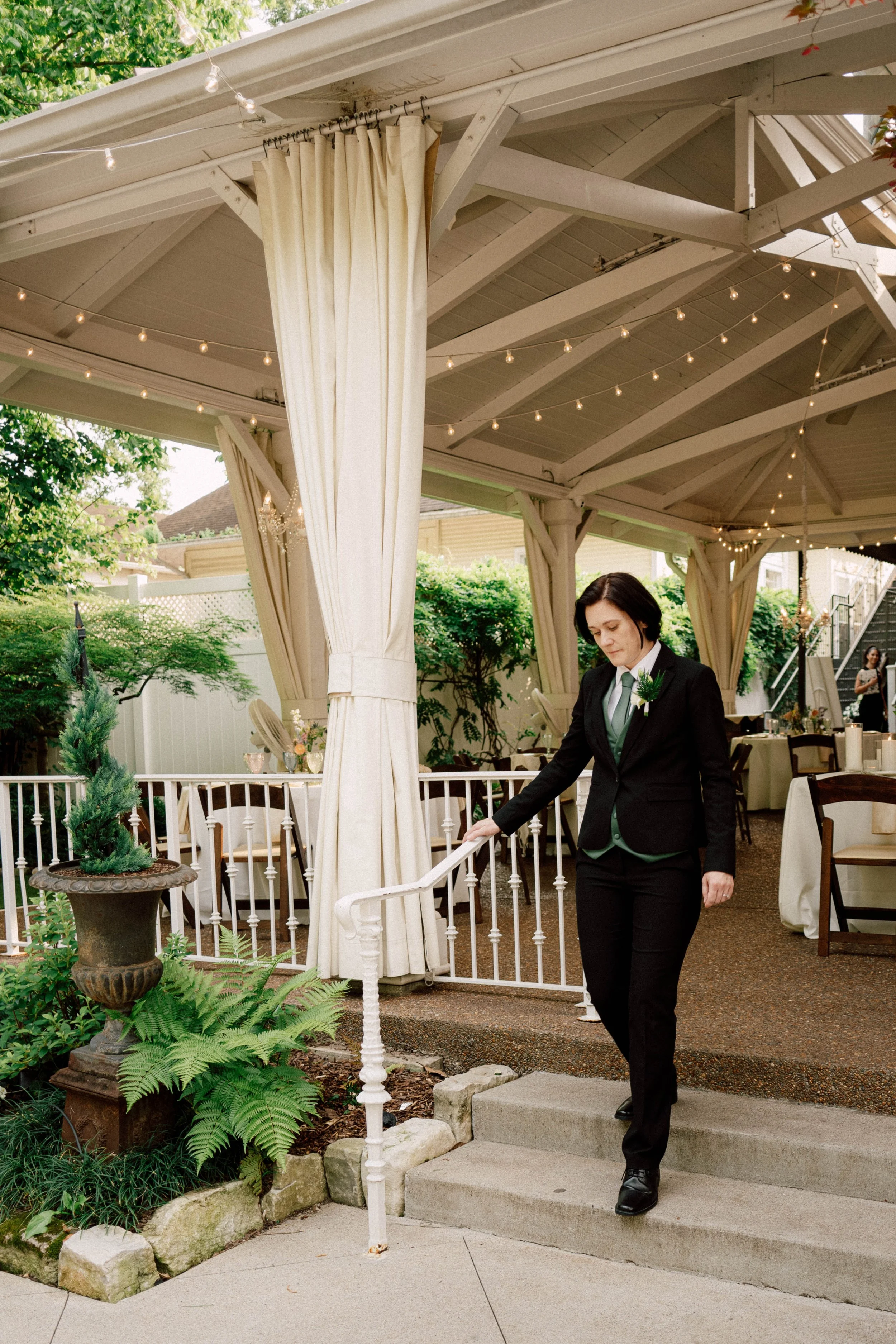 HRD26-lgbtq-bride-in-suit-walking-in-wedding.jpg