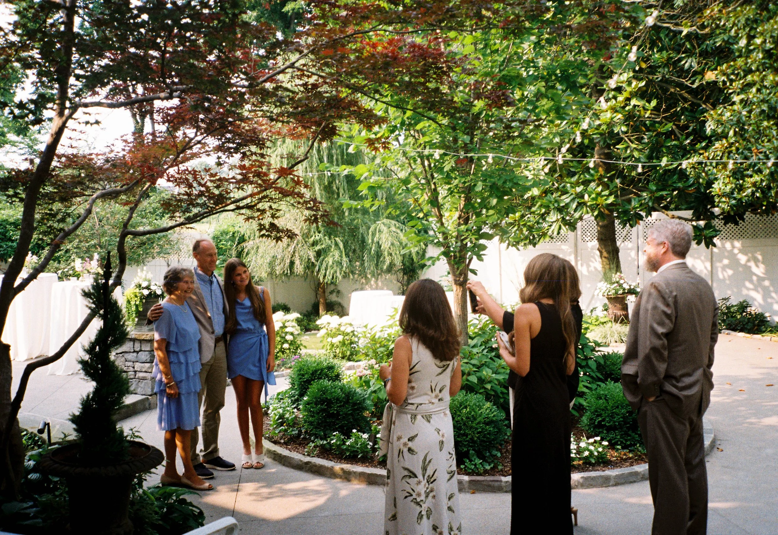HRF33-family-taking-photos-at-wedding.jpg