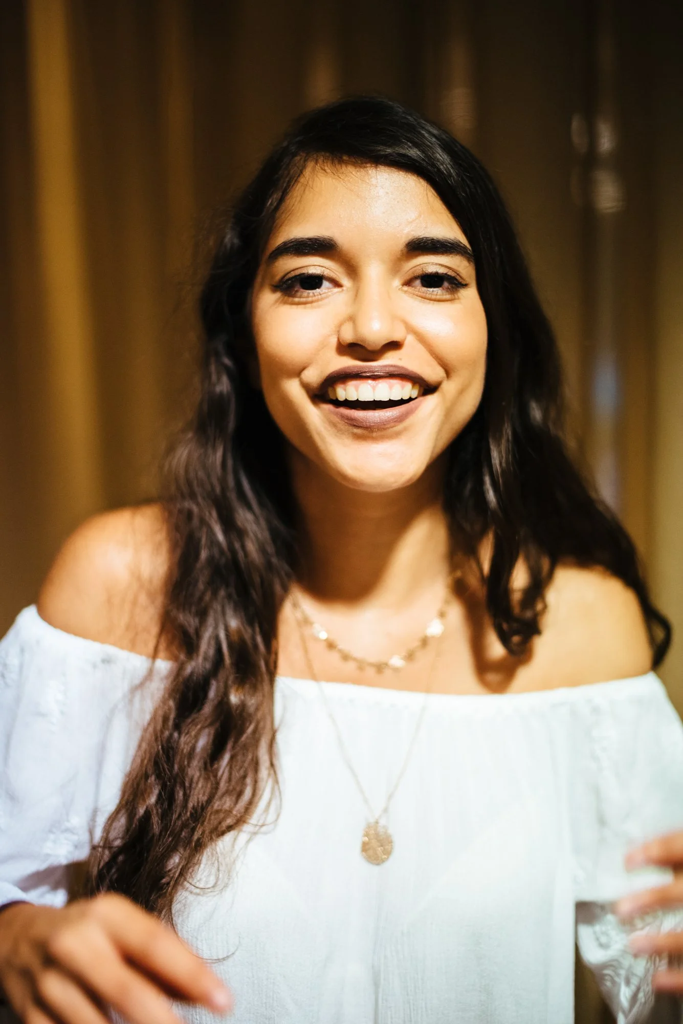 BT151-latinx-nonbinary-person-long-hair-dark-lips.jpg