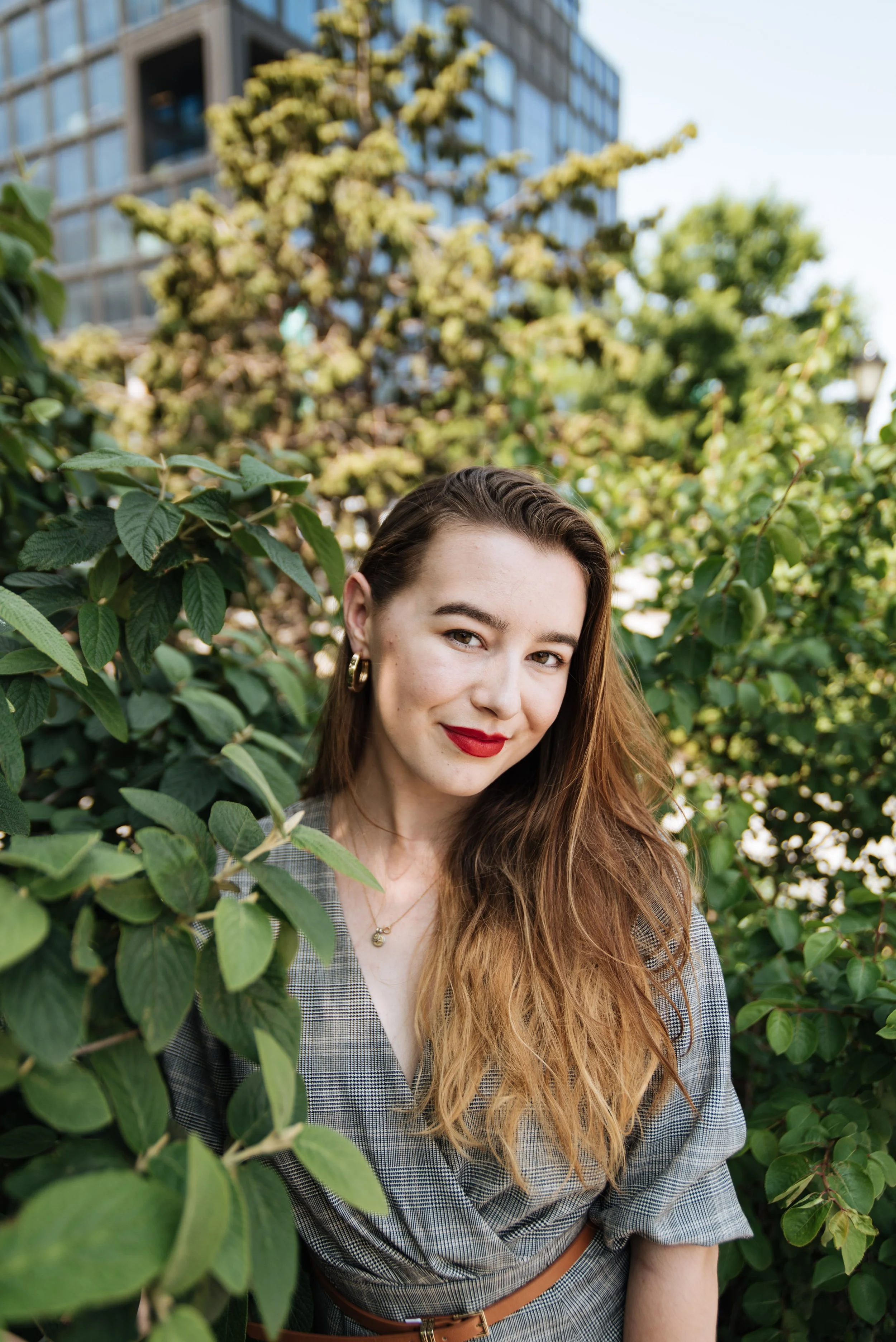 BT335-brown-hair-red-lips-woman-in-leaves.jpg