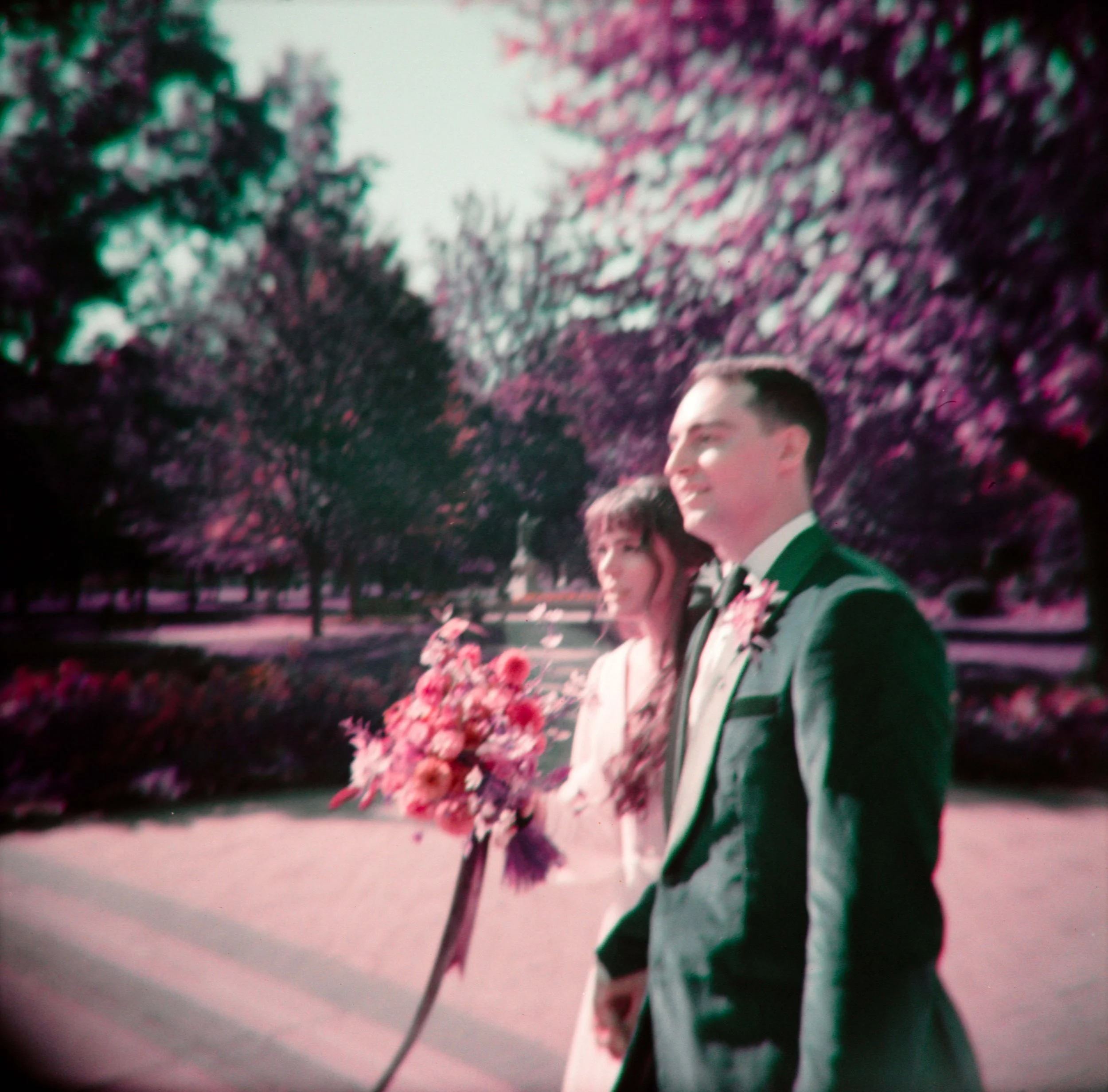 LBW16-wedding-couple-walking-lomo-purple-film.jpg