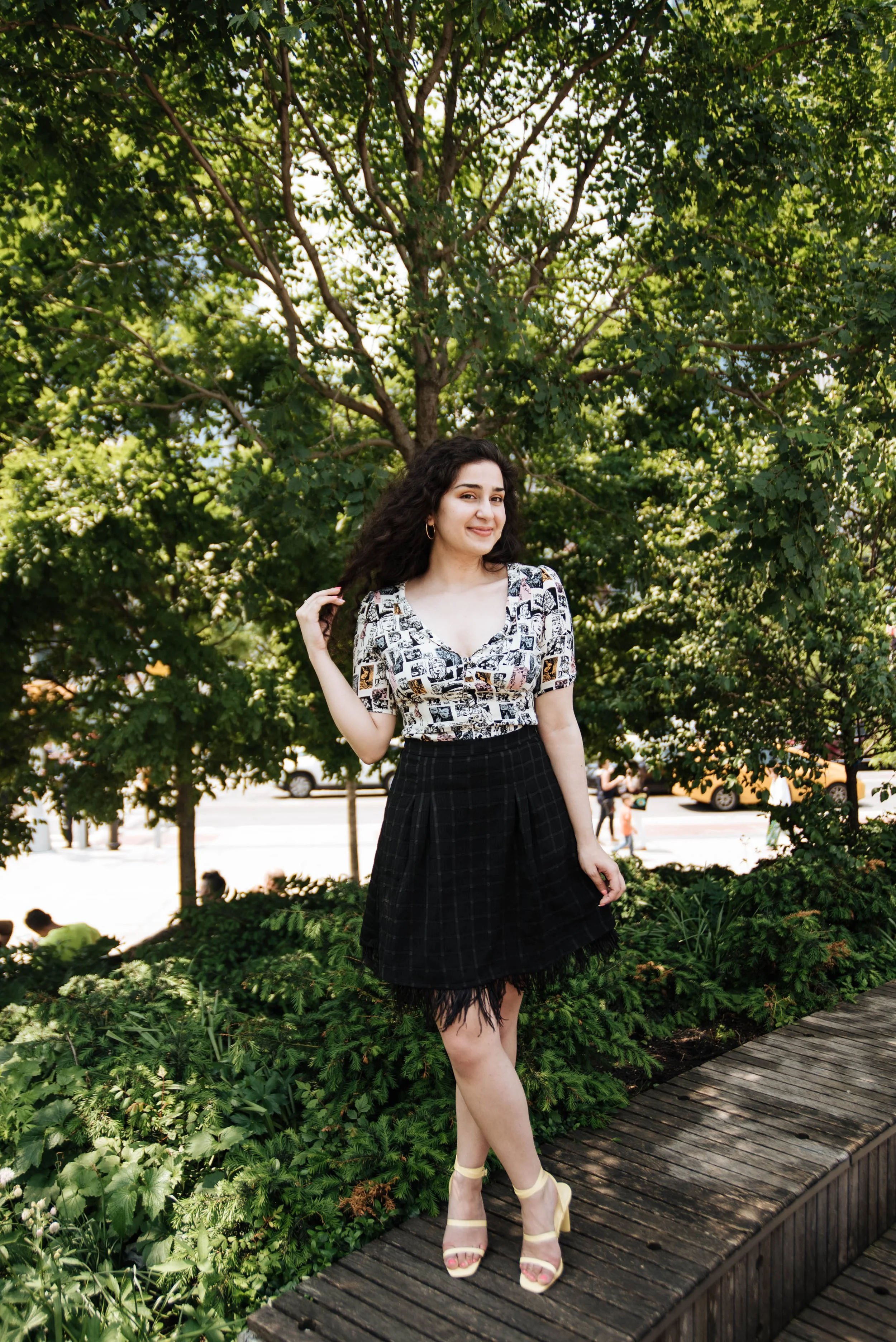 BT346-woman-curly-hair-black-skirt.jpg