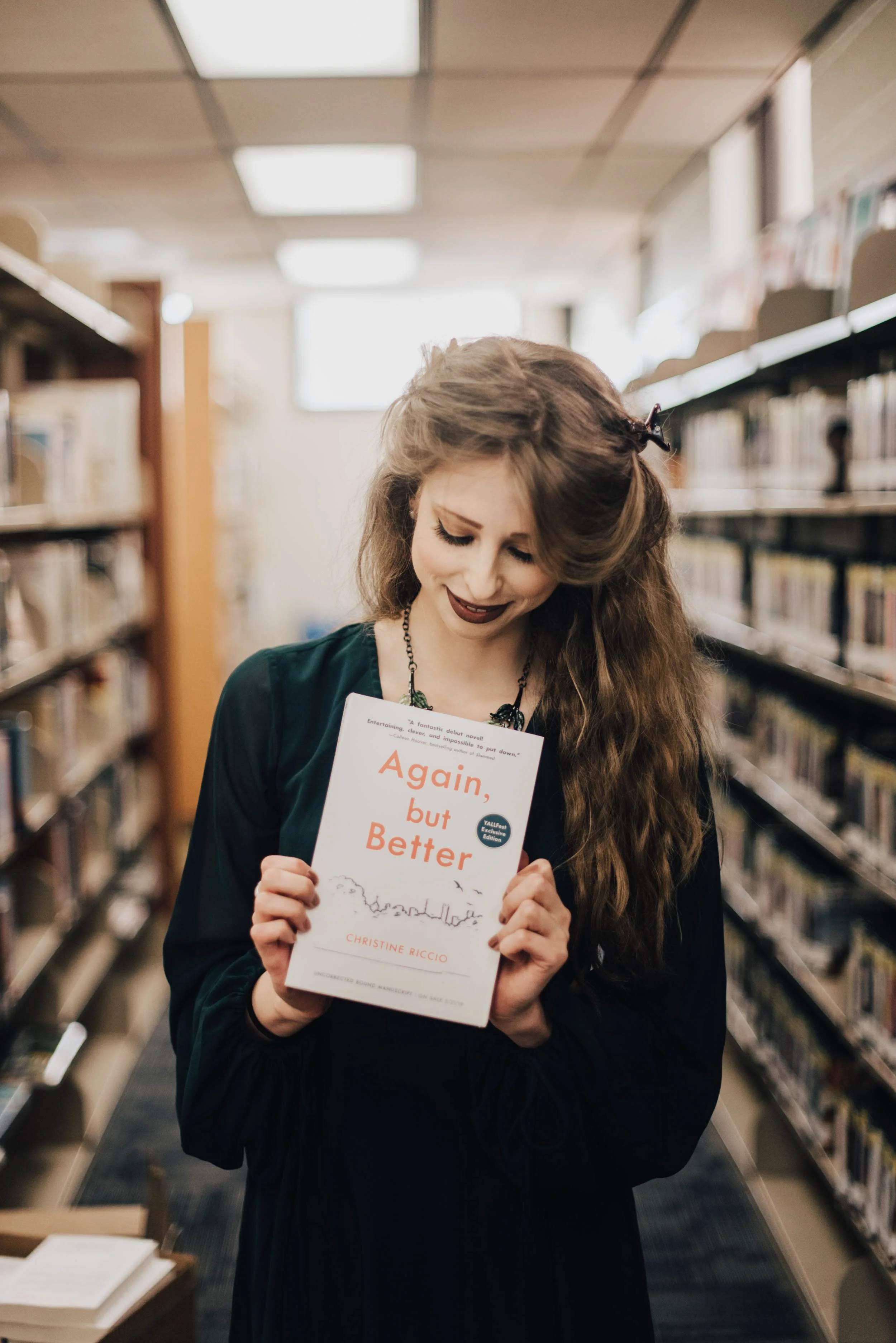 BT157-christine-riccio-with-again-but-better-book.jpg