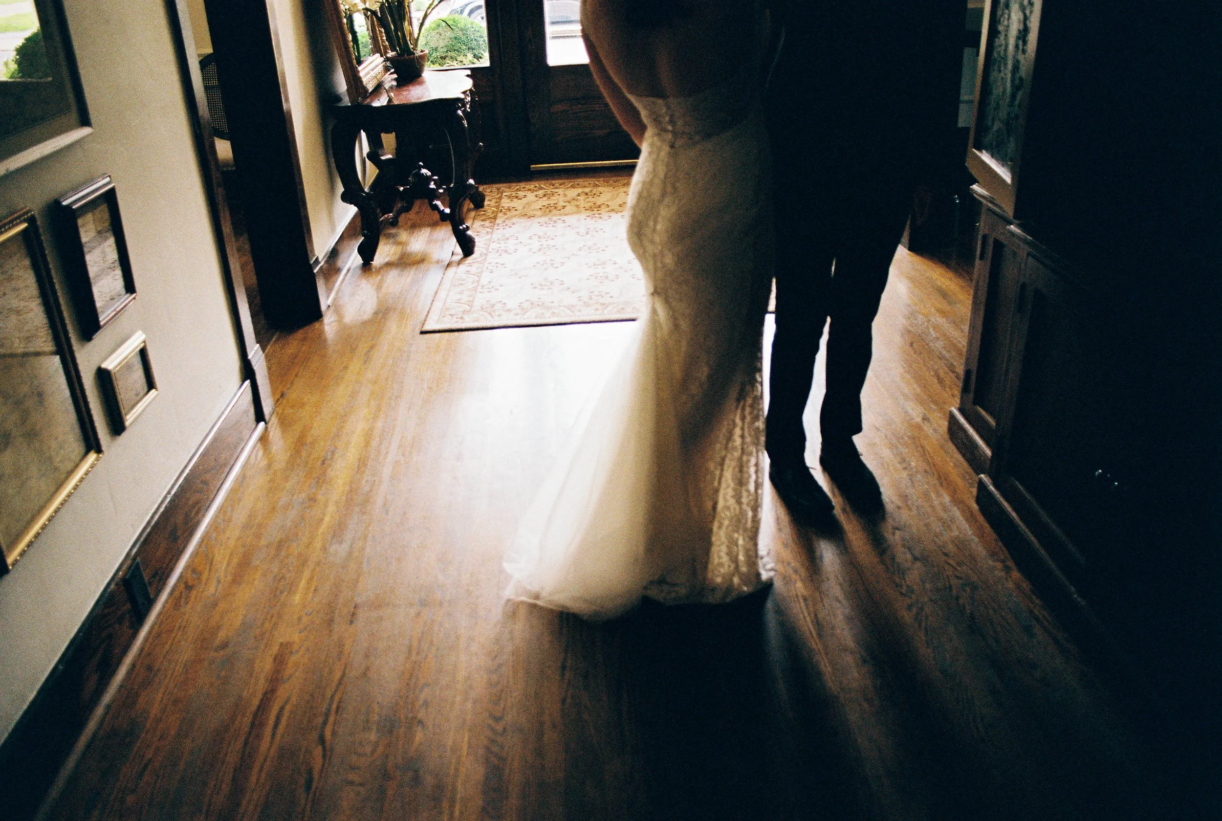 HRF20-lgbtq-brides-in-hallway-shadow.jpg