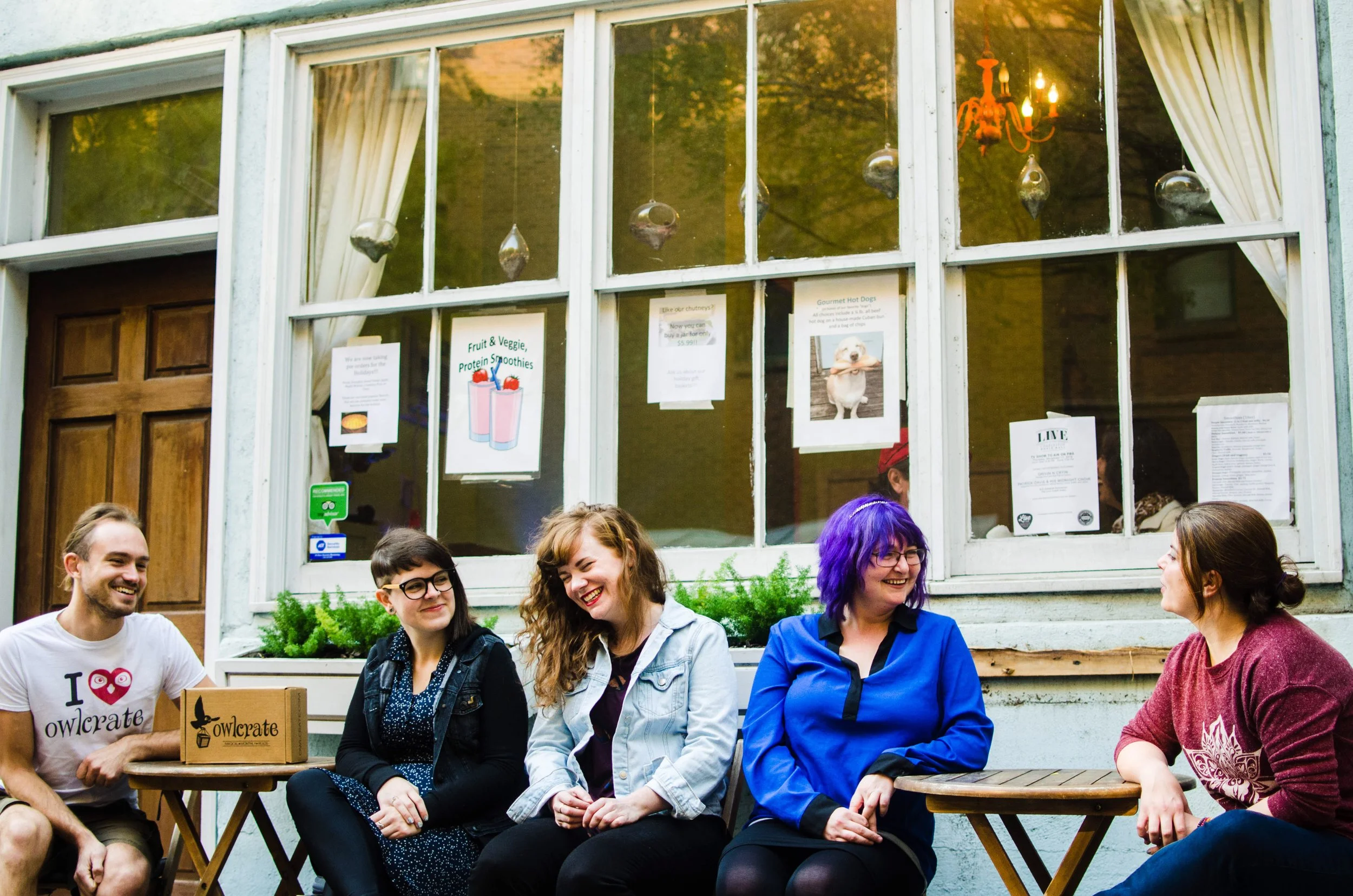 BT96-owlcrate-staff-sitting-outside-cafe.jpg