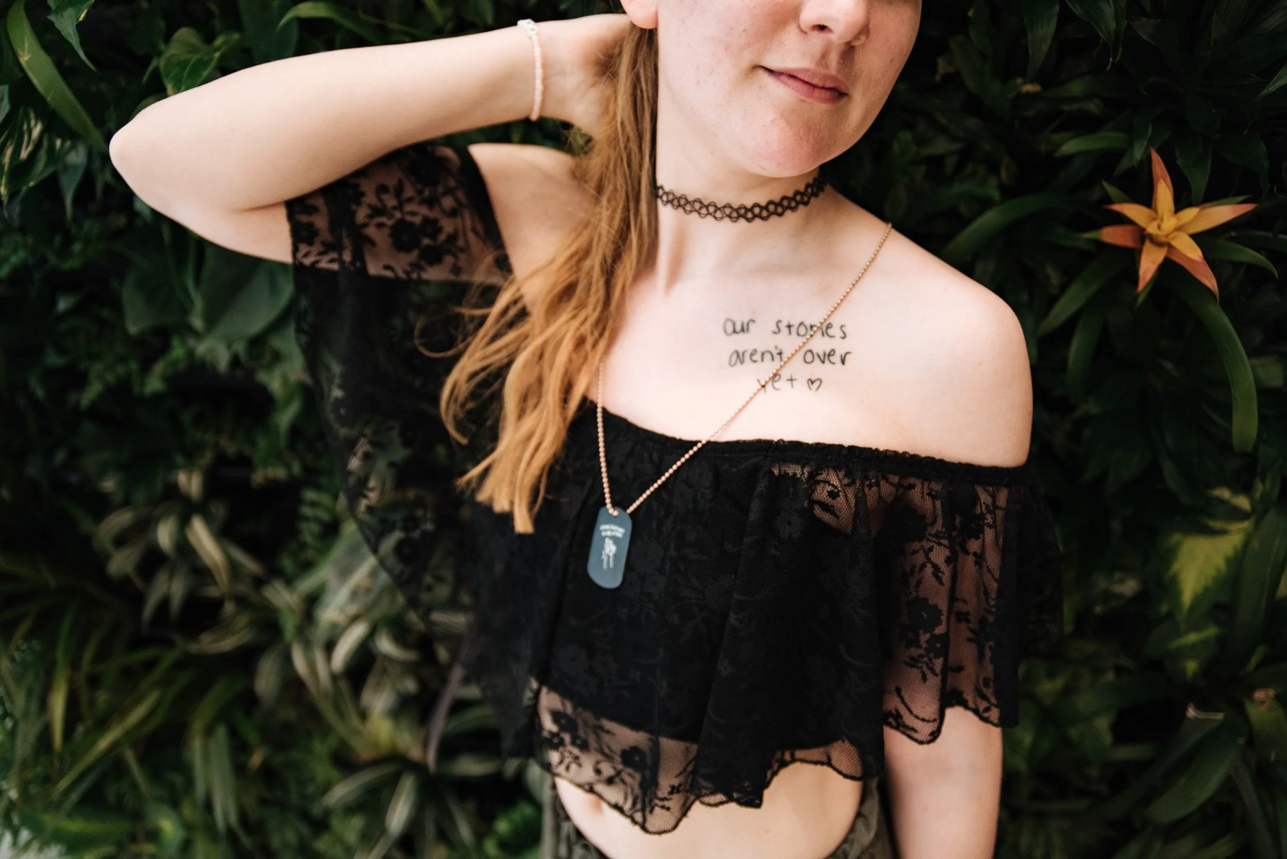 BT259-woman-long-hair-tattoo-arm-up.jpg