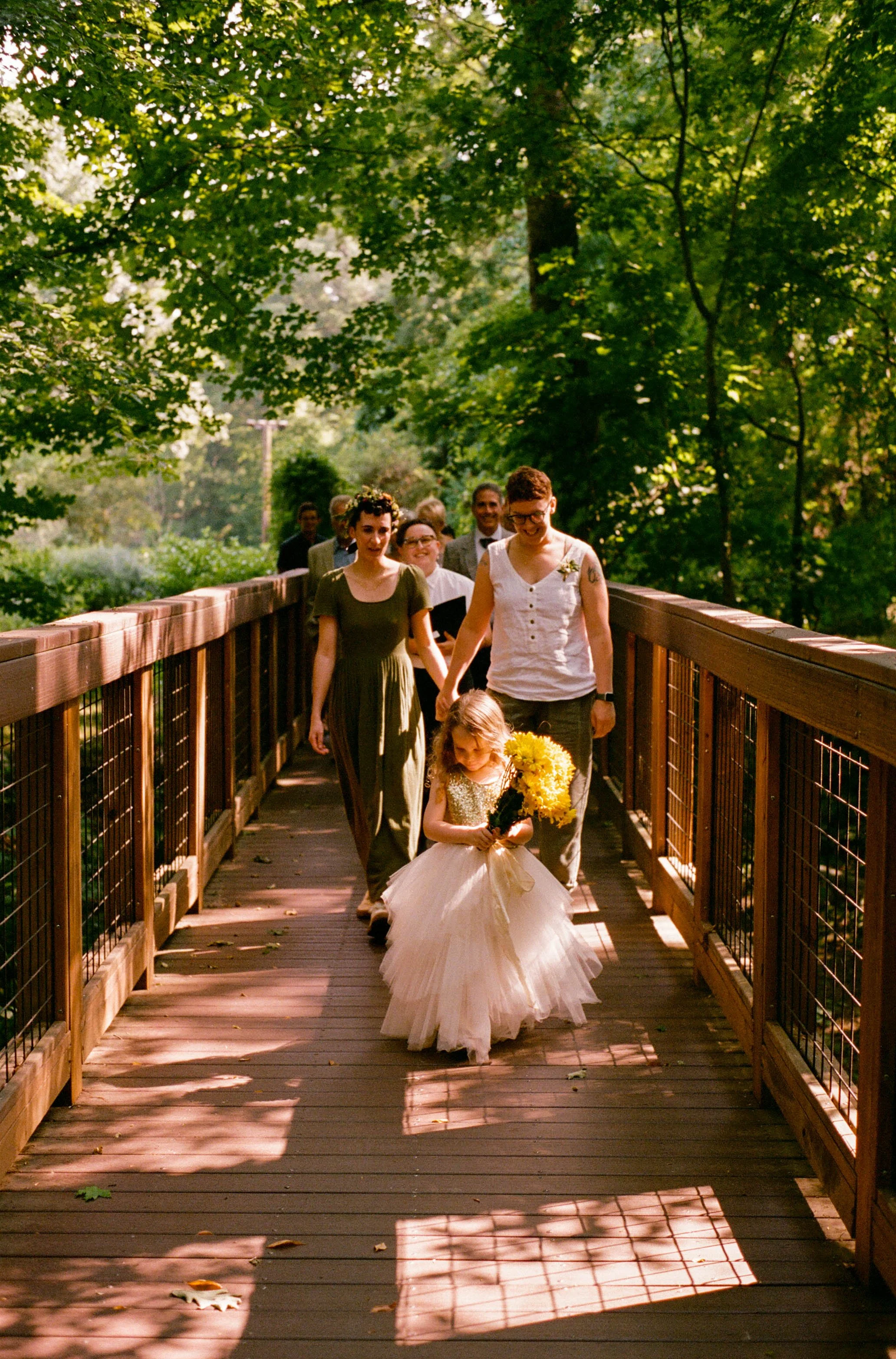 REW43-flower-girl-lgbtq-wedding-on-bridge.jpg