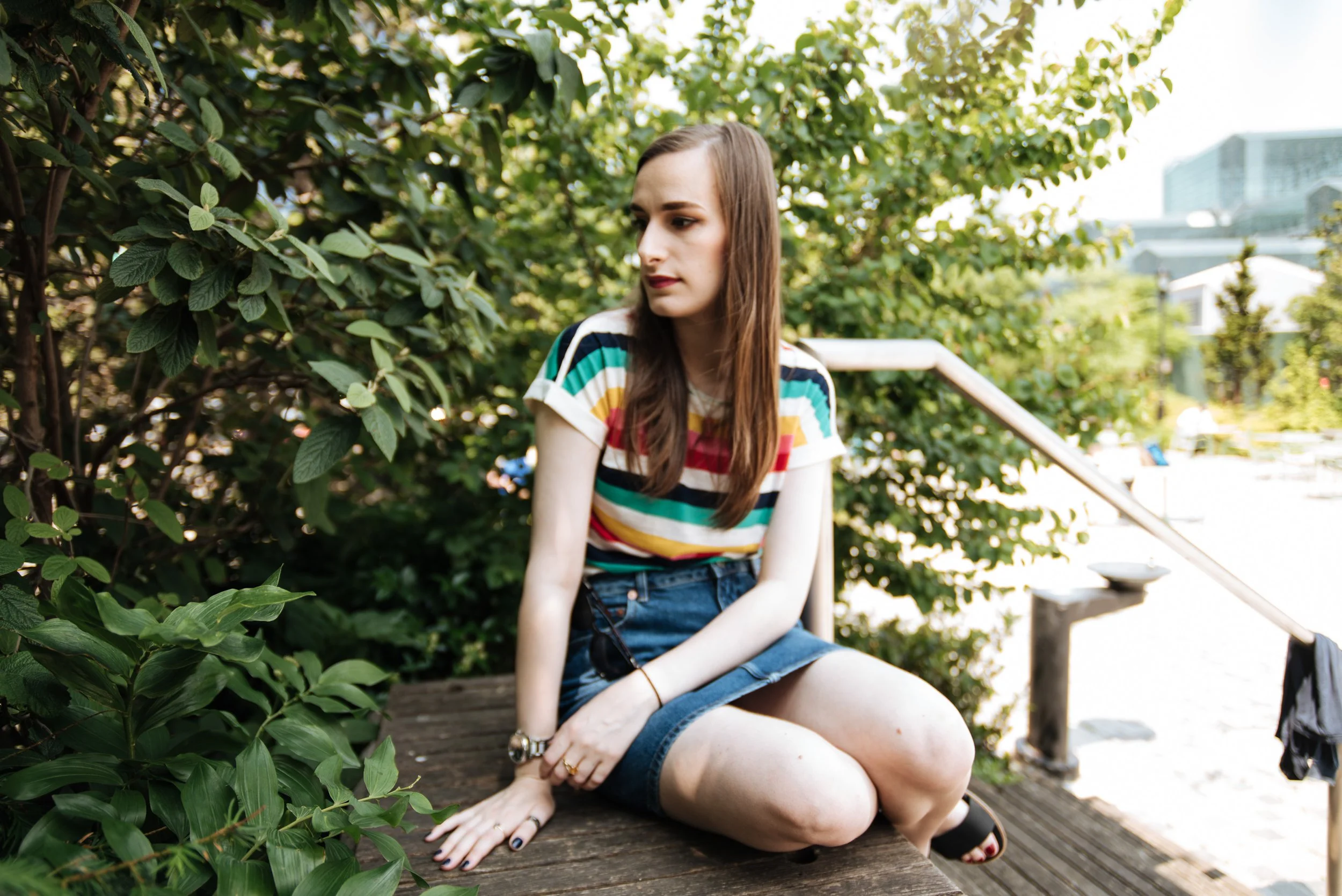 BT338-woman-sitting-striped-shirt.jpg