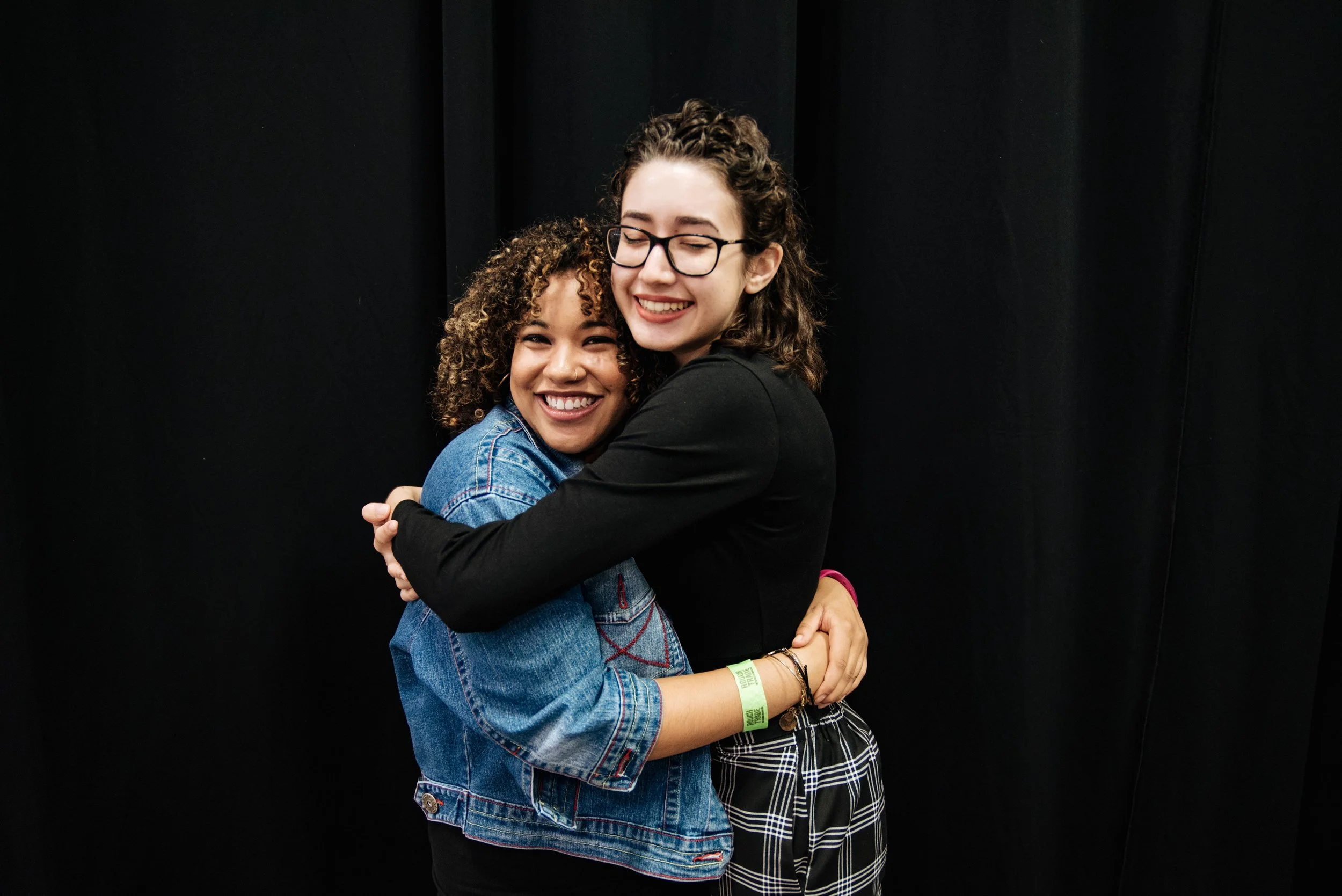 BT435-two-women-hugging-smiling.jpg