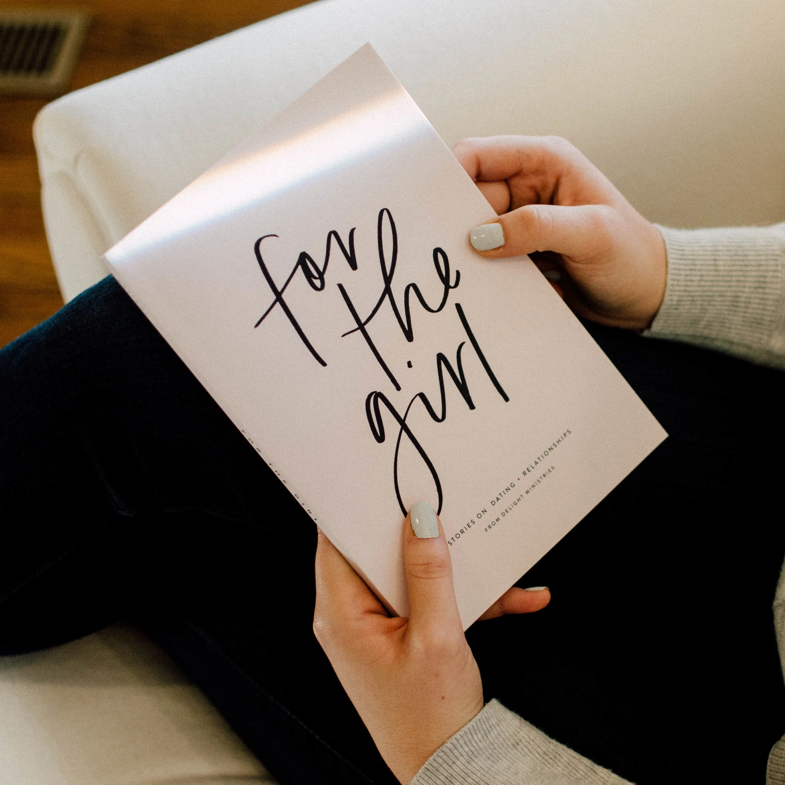 d185-woman-holding-for-the-girl-book.jpg