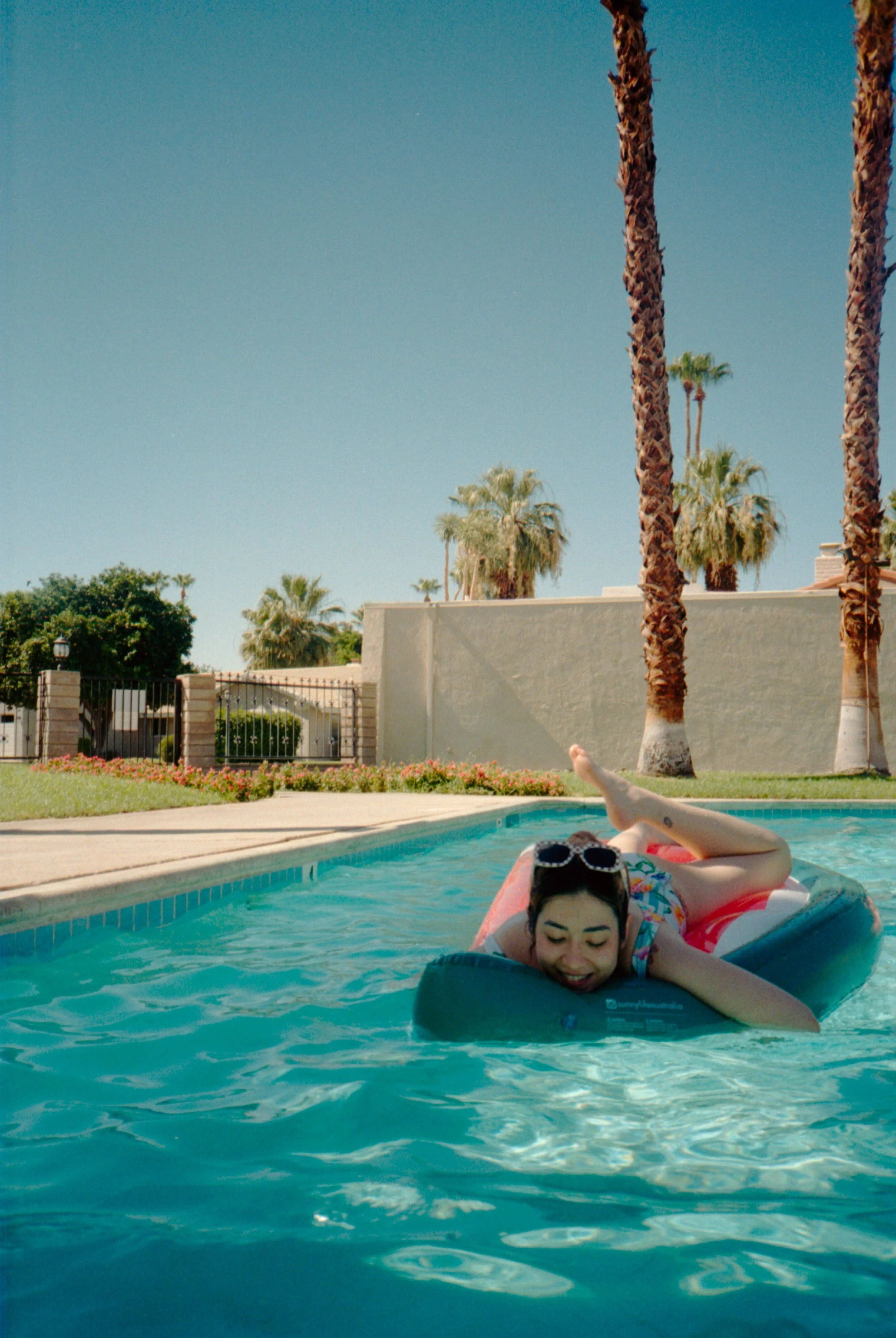 BT63-woman-floating-in-pool.jpg