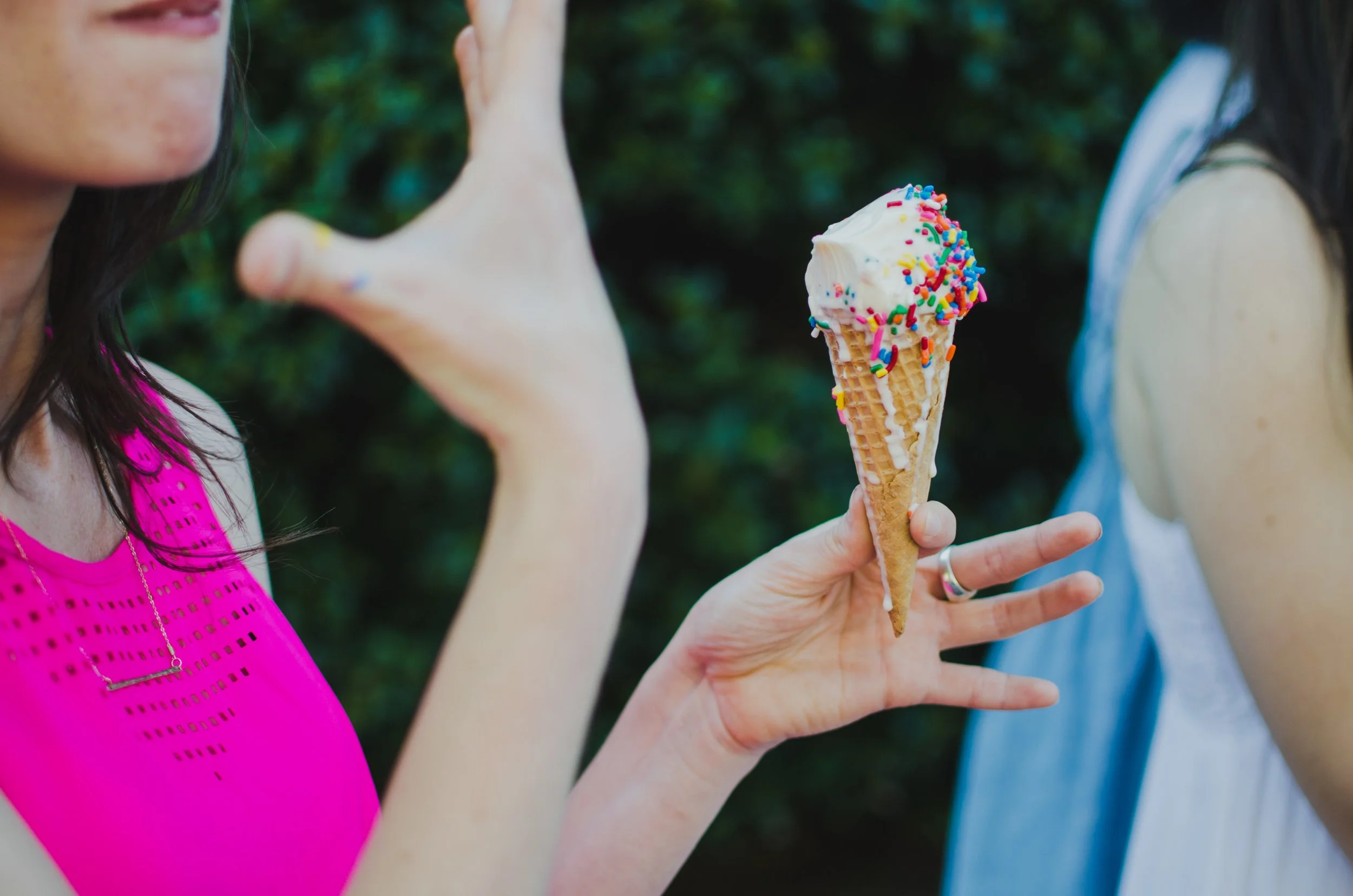 d146-woman-holding-ice-cream-cone.jpg
