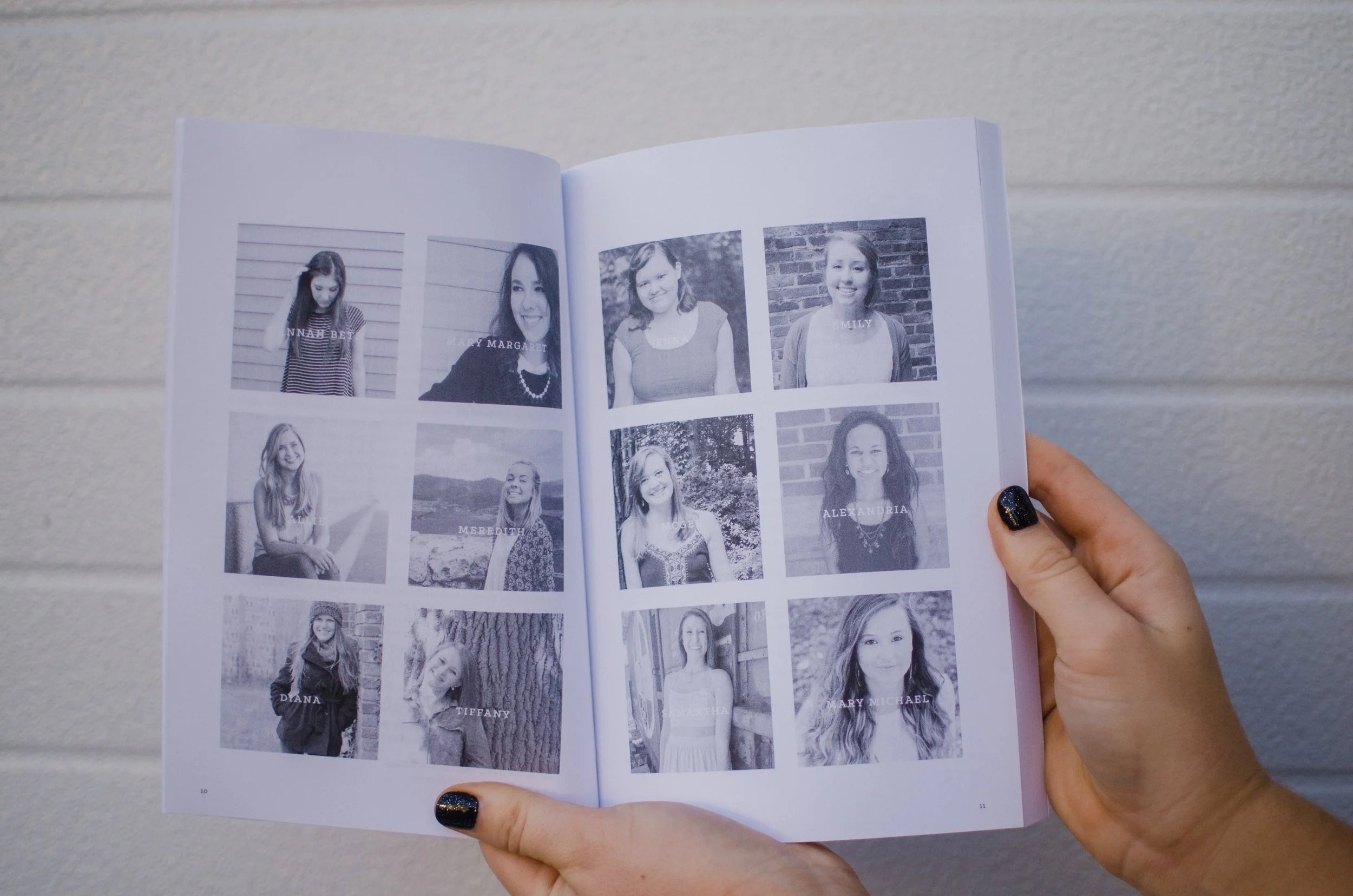 d134-woman-holding-book-open.jpg