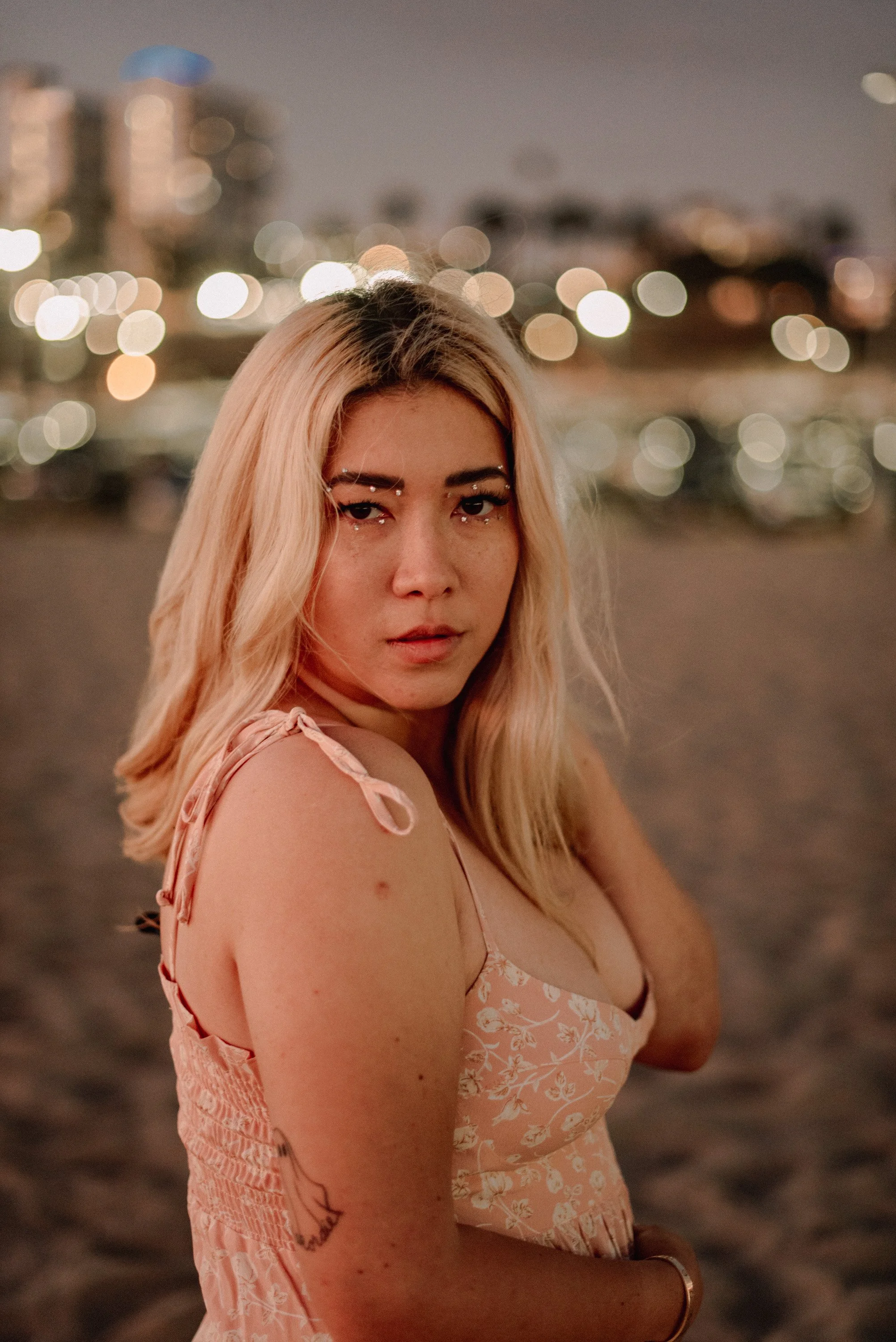 BT14-blonde-asian-woman-sunset-city-lights.jpg