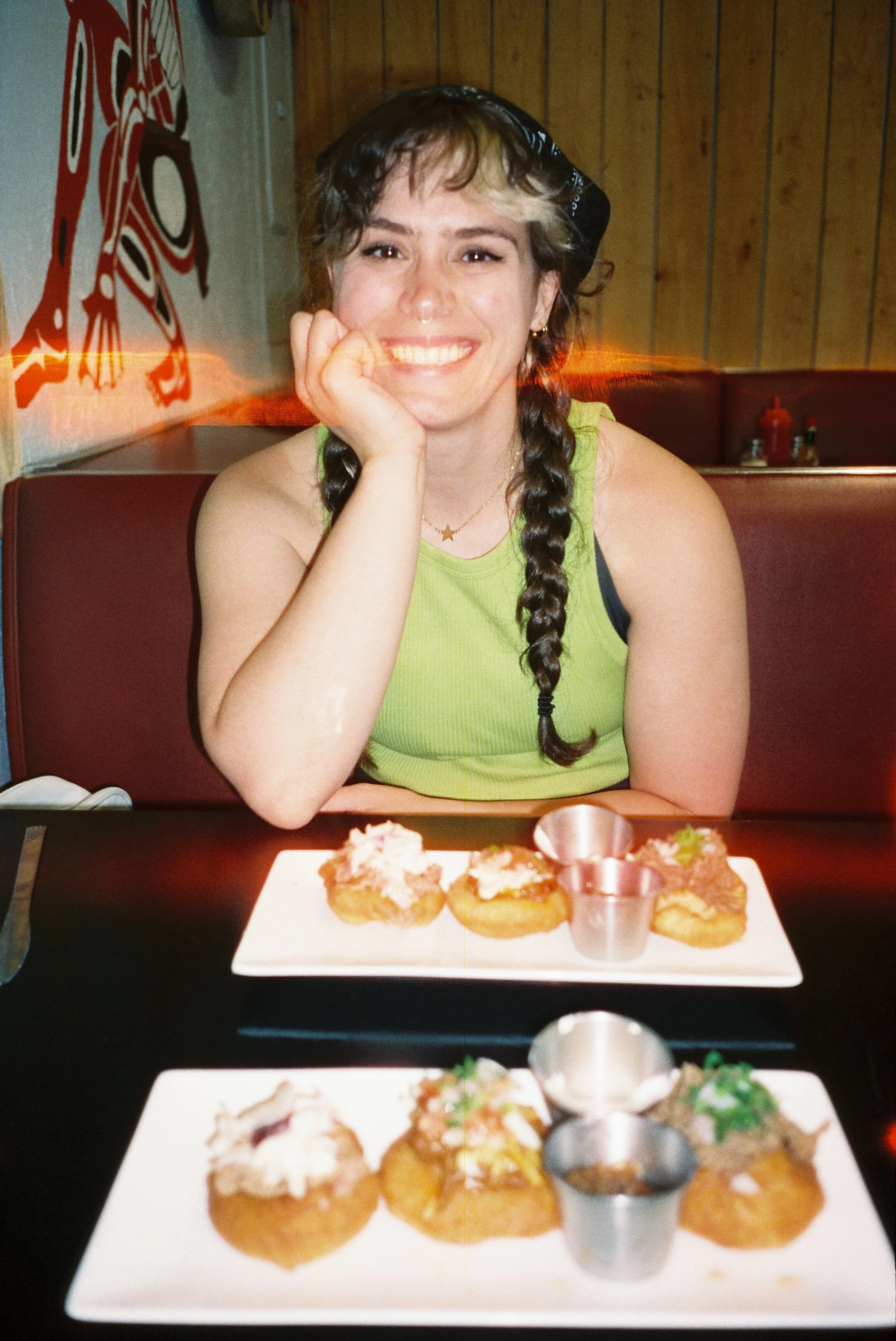 pnw134-woman-with-frybread-longhouse-cafe-forks-washington.jpg