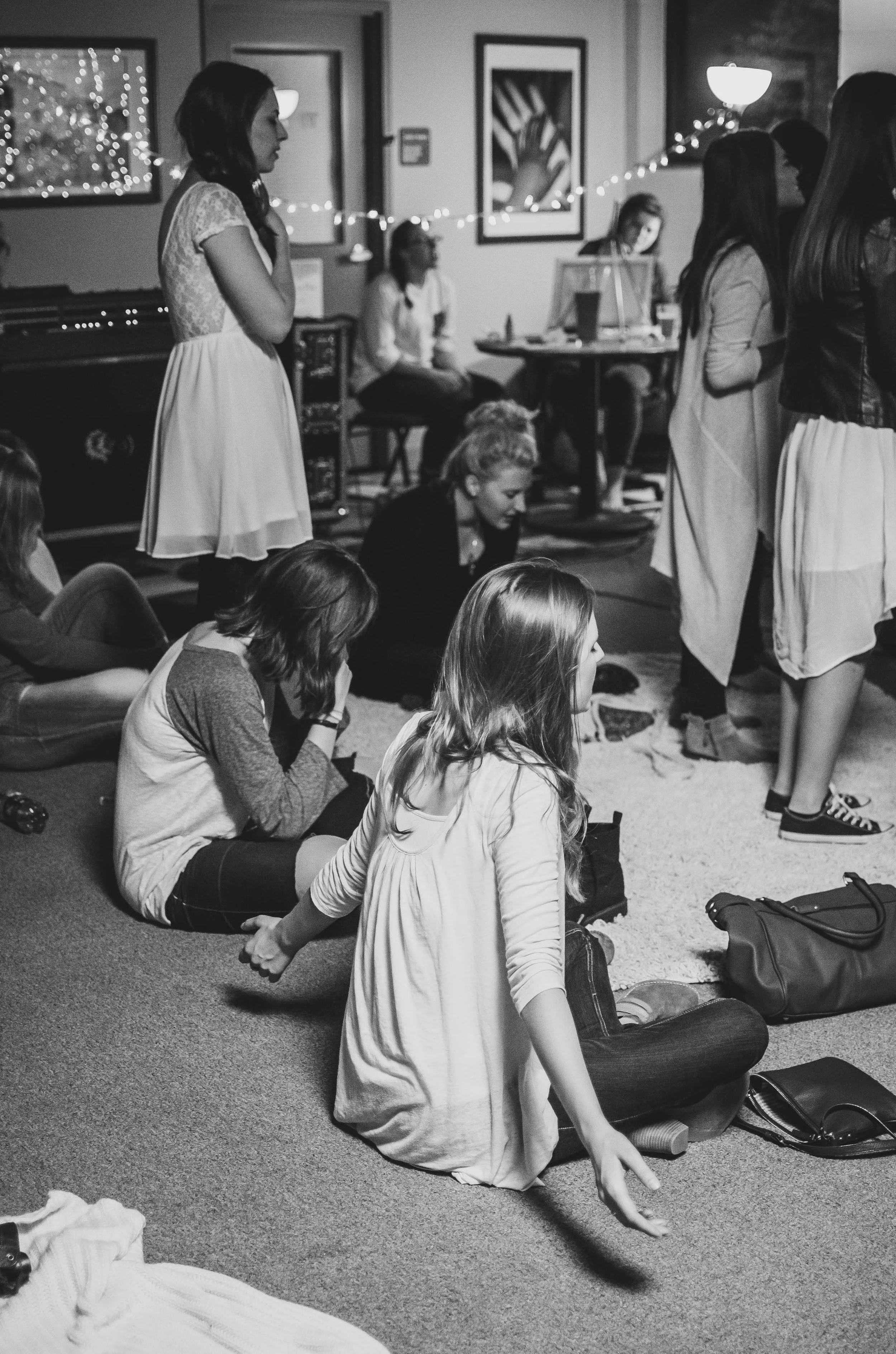 d36-women-worshipping-on-ground.jpg
