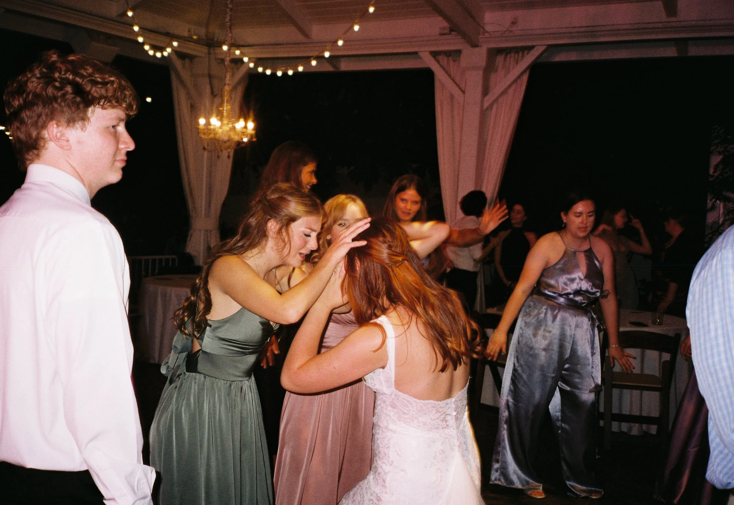 HRF95-bride-dancing-at-reception-with-bridesmaids.jpg