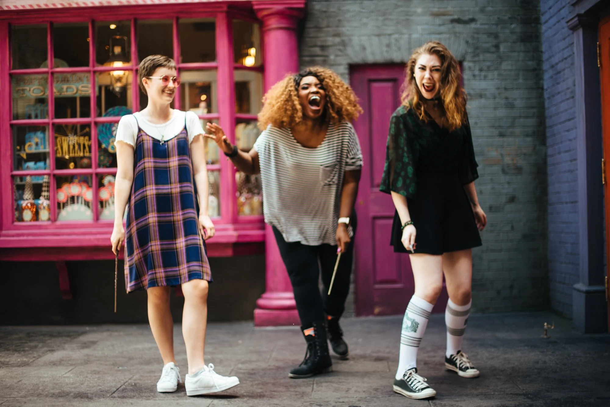 BT100-three-people-with-magic-wands.jpg